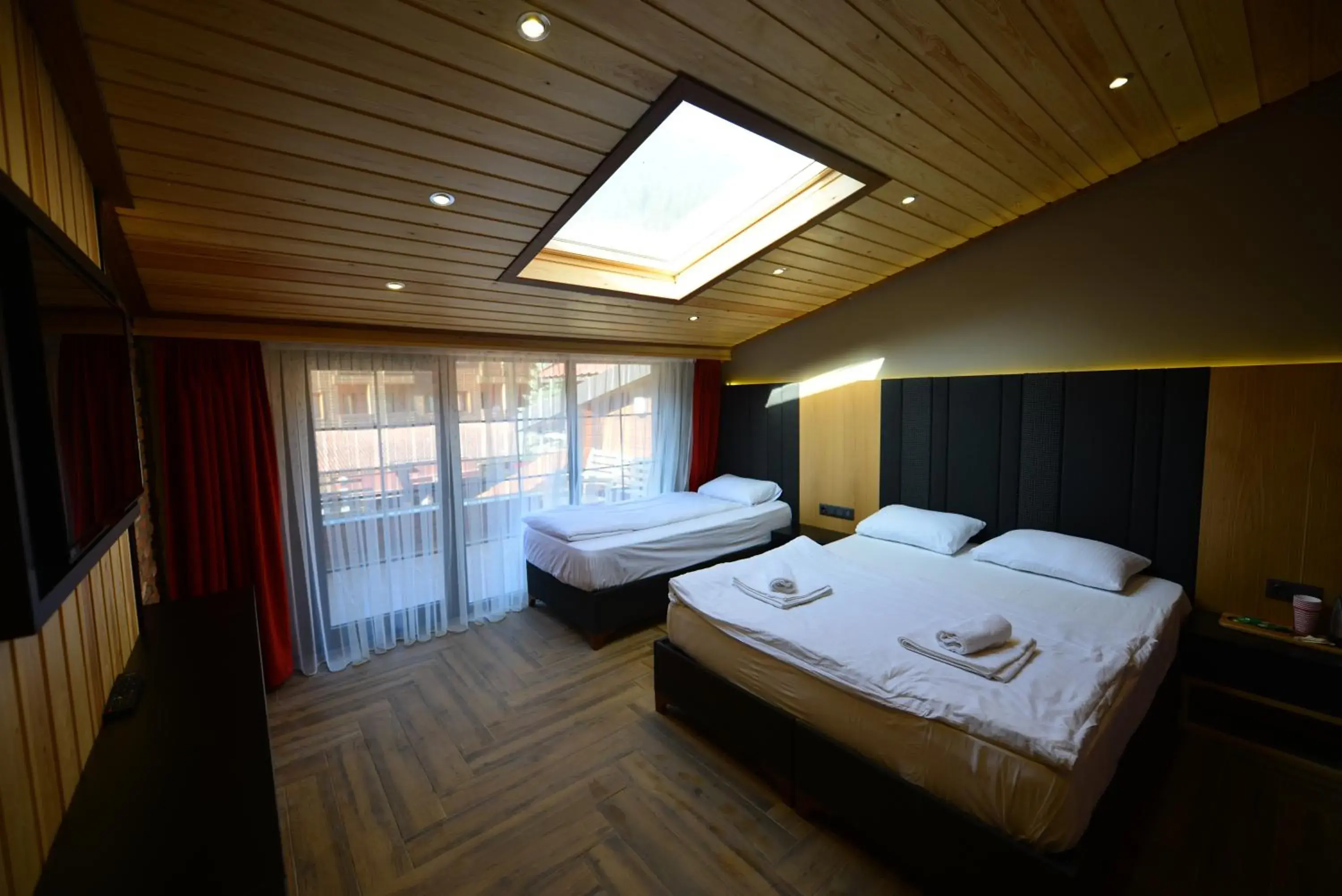 Bed in Inanlar Deluxe Hotel & Bungalow Bed in Inanlar Deluxe Hotel & Bungalow