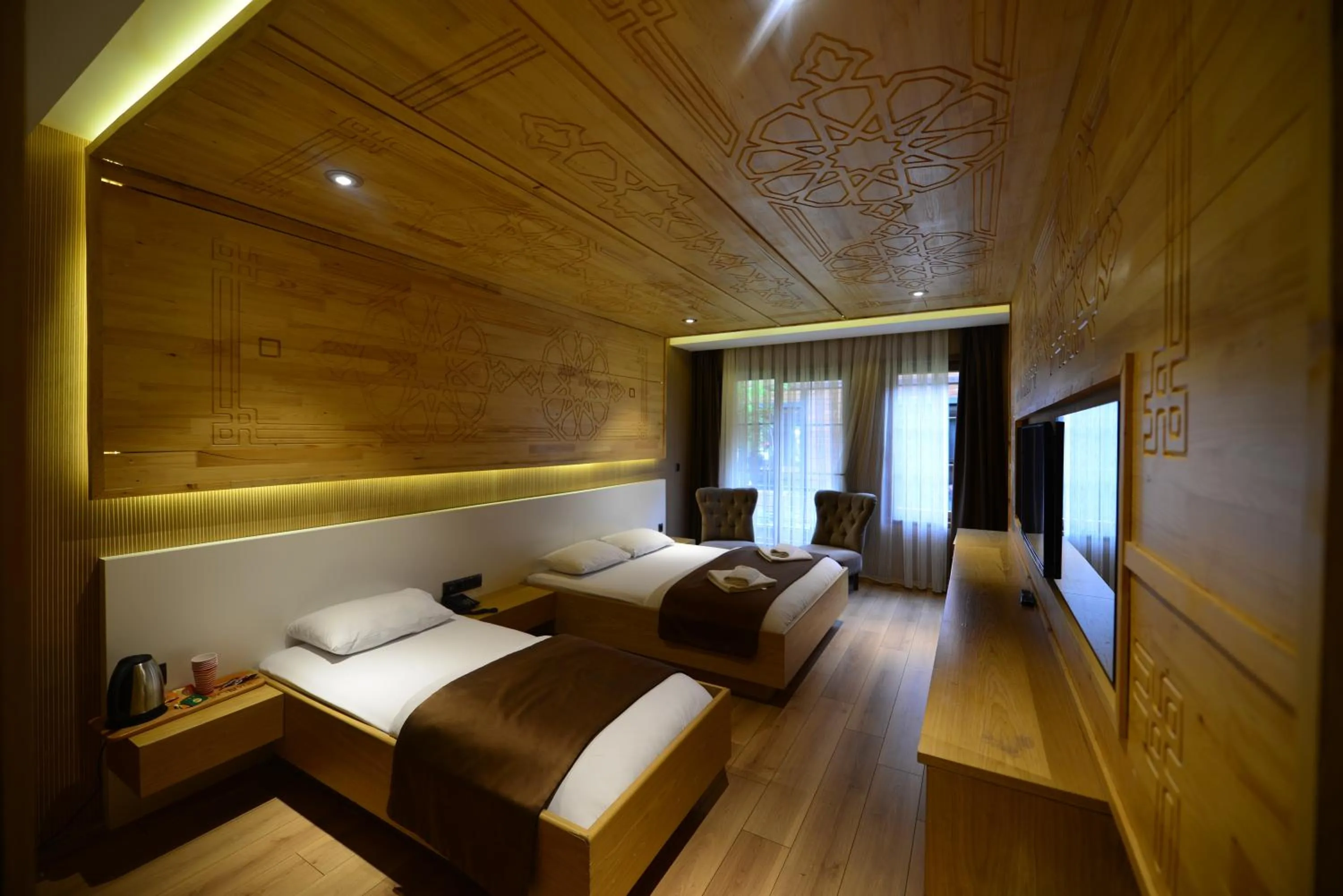 Bed in Inanlar Deluxe Hotel & Bungalow