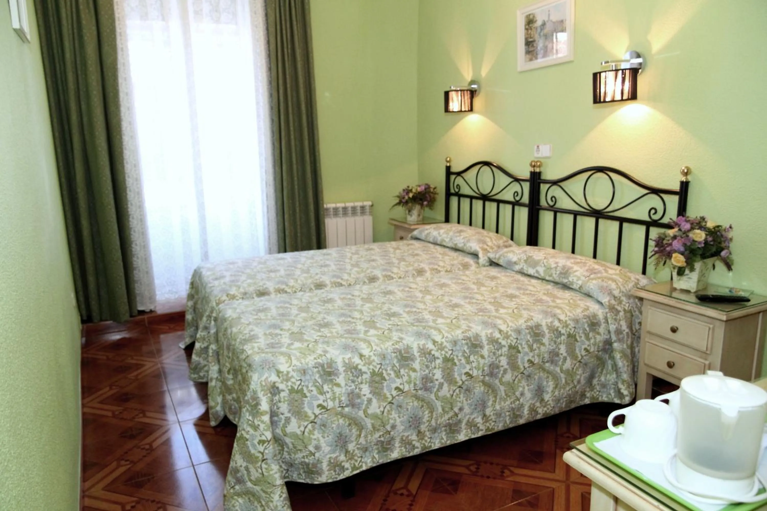 Bed in Hostal Los Alpes