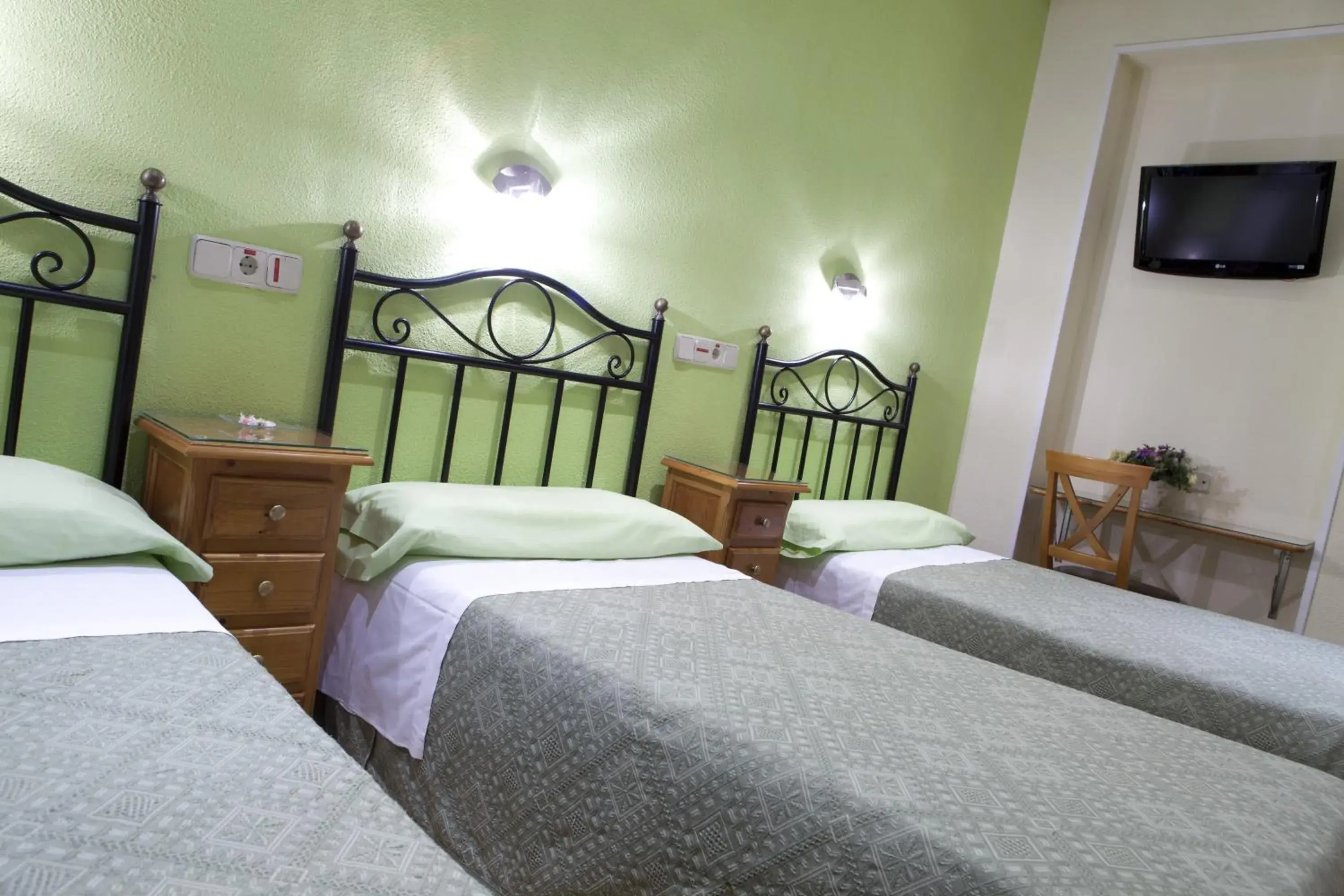 Bed in Hostal Los Alpes Bed in Hostal Los Alpes