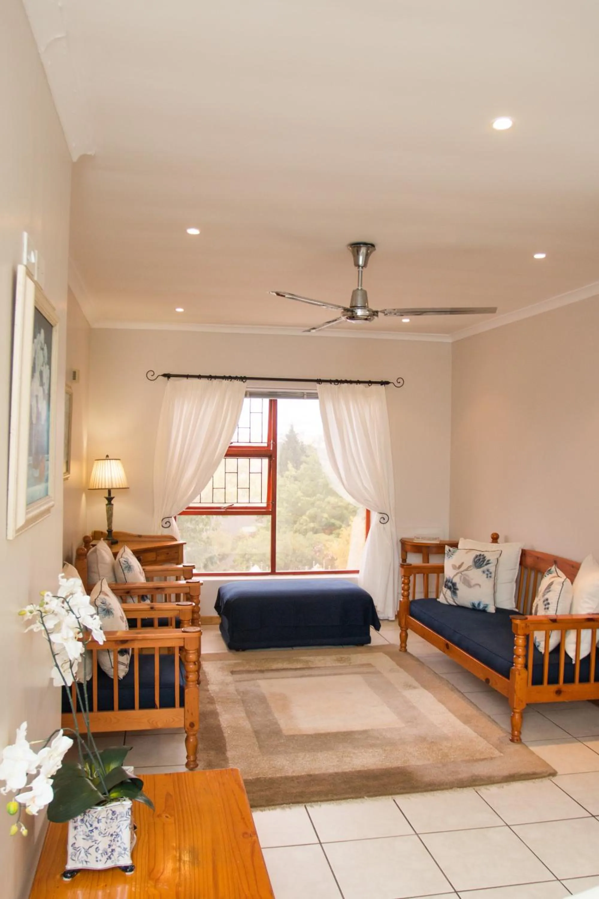 Bed in Jenny's Guest House