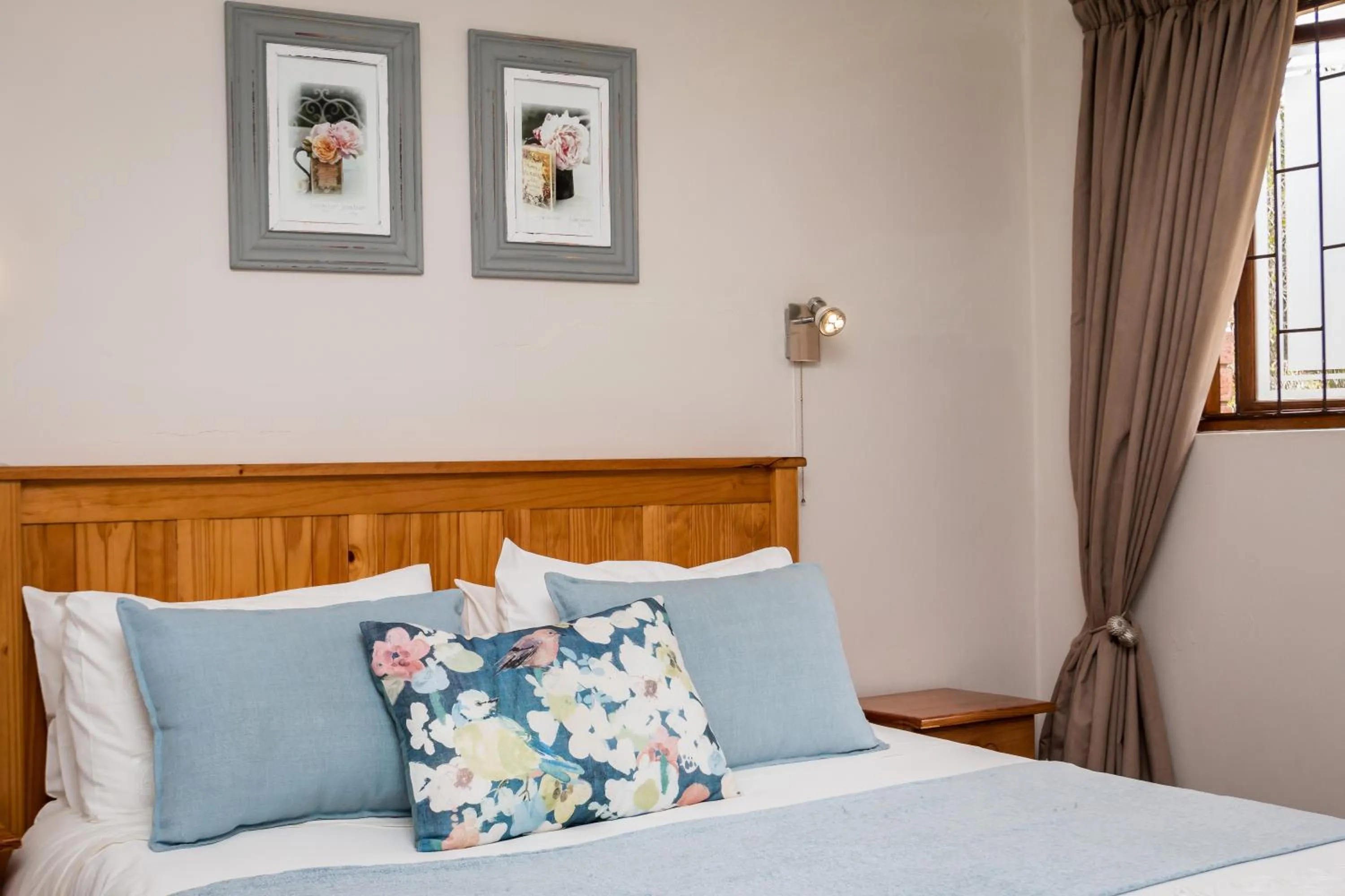 Bed in Jenny's Guest House