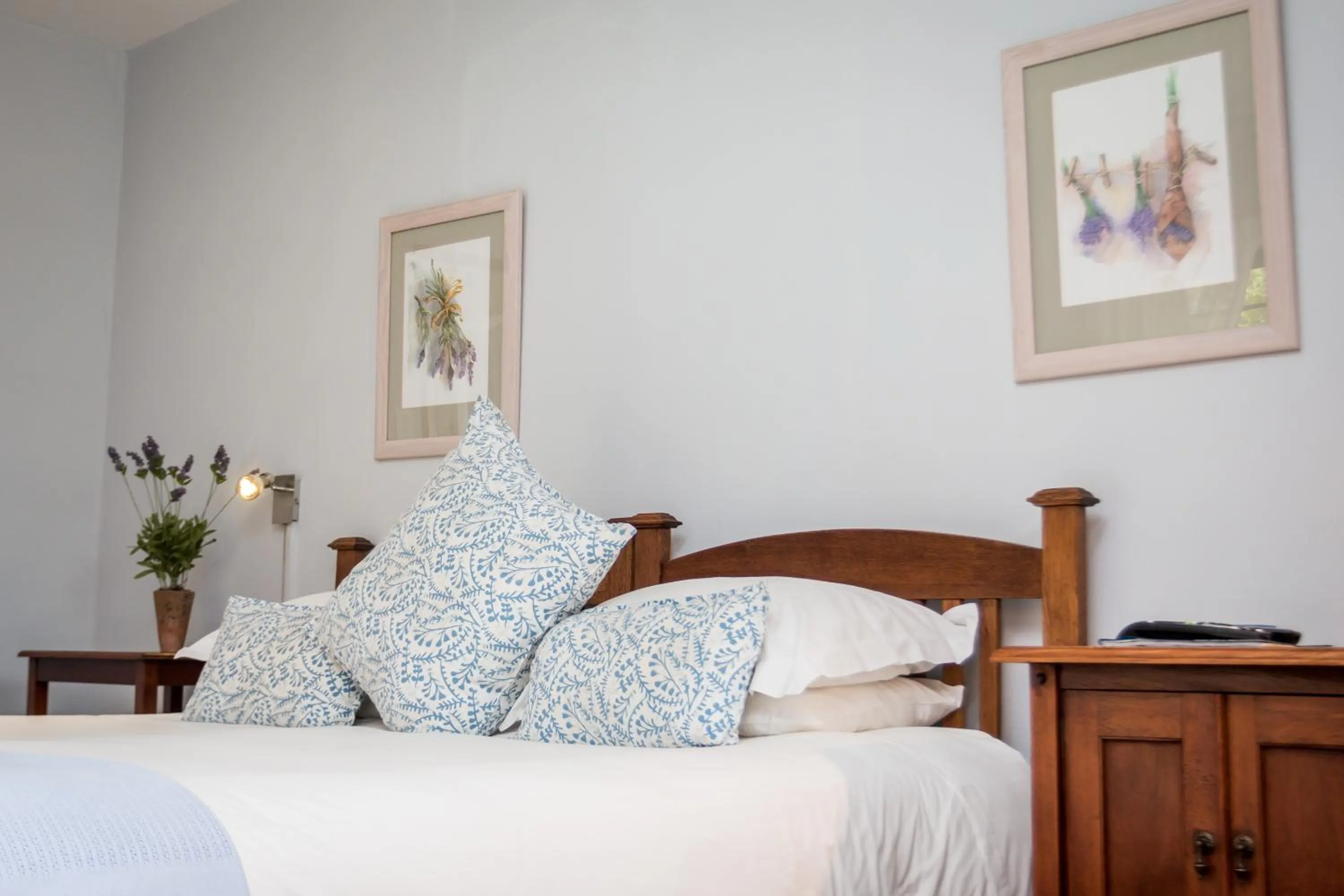 Bed in Jenny's Guest House