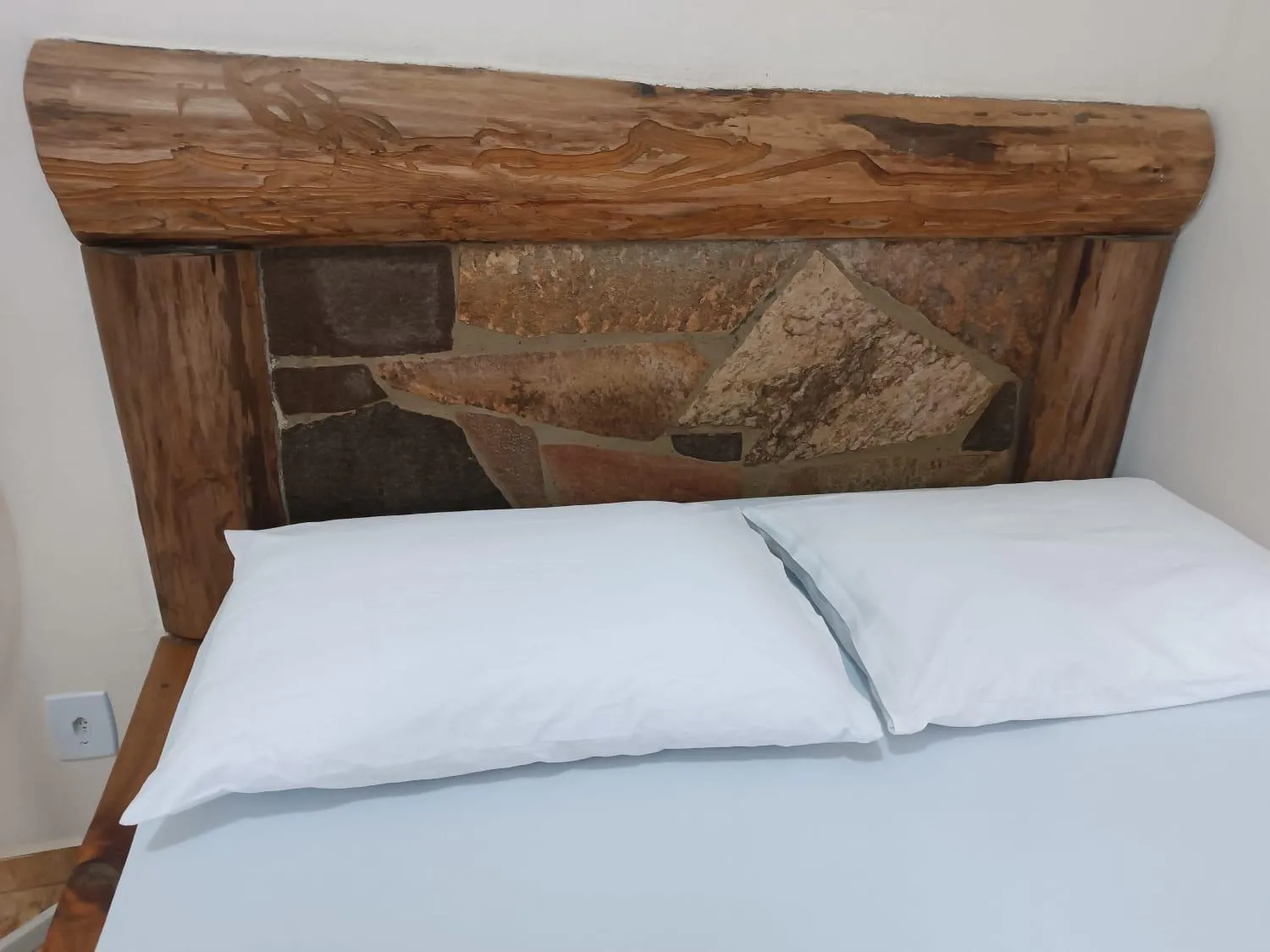 Bed in Pousada Rústica