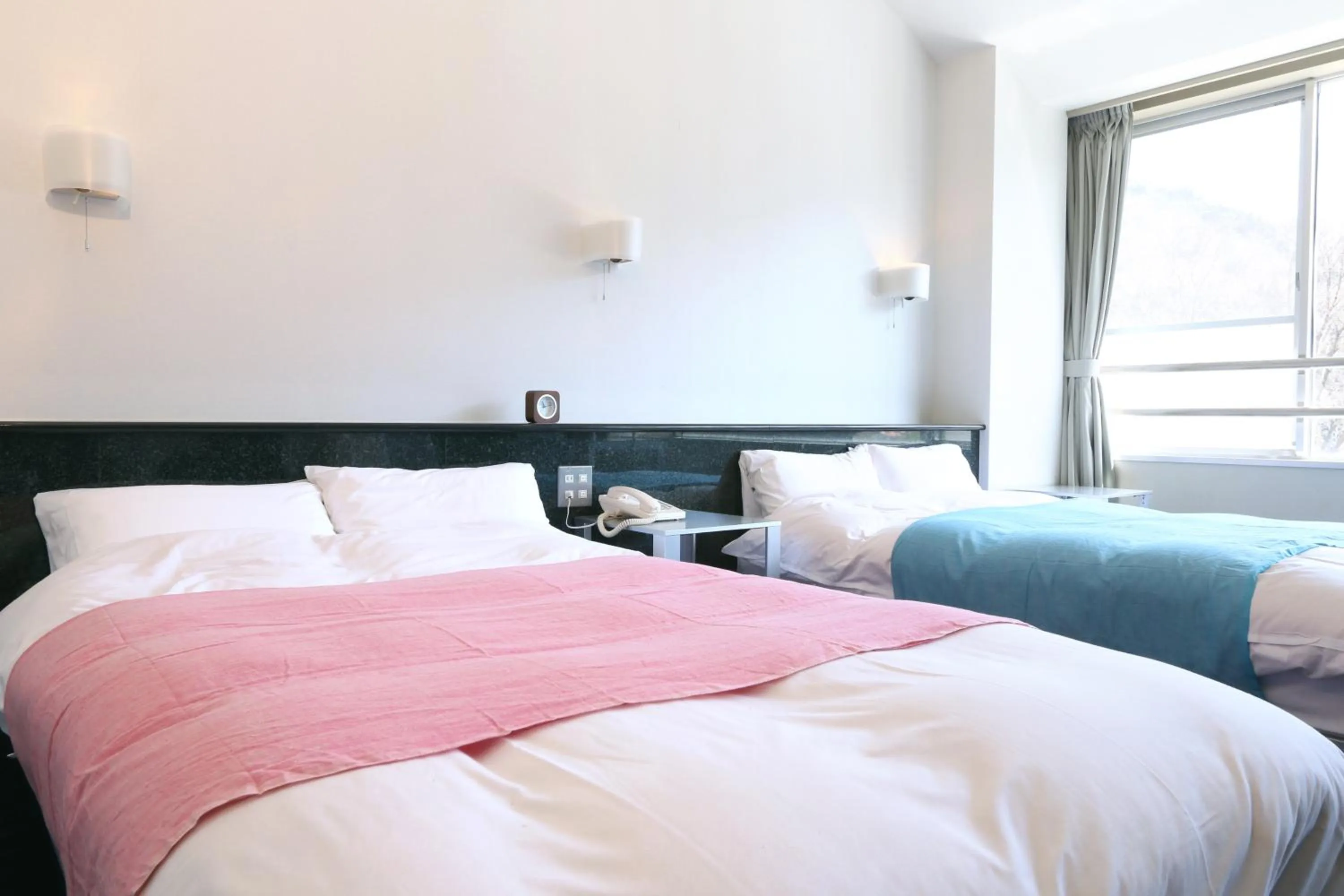 Bed in Sora no Mori Hotel Hanagori