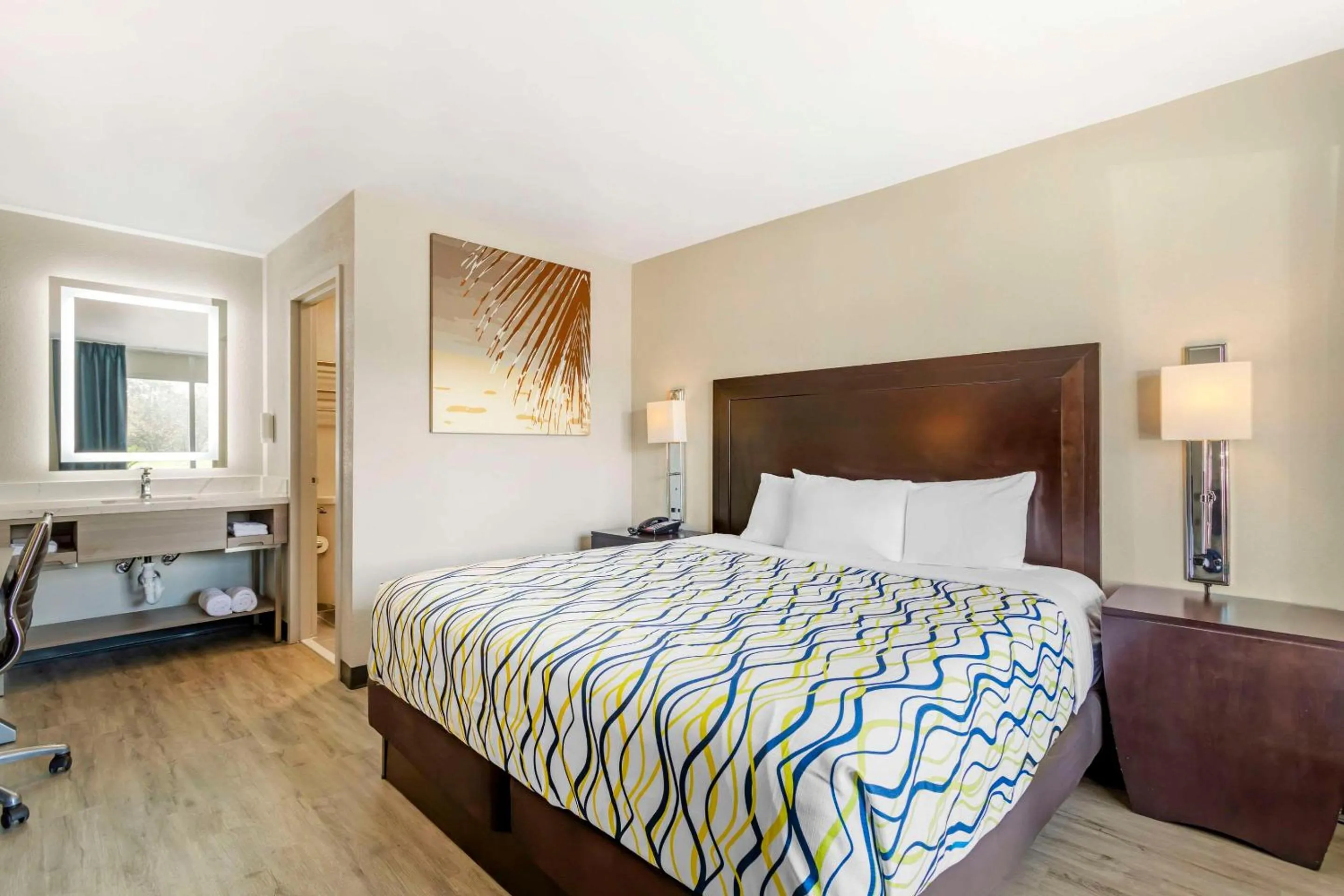 Bedroom, Bed in Rodeway Inn Orange Park - Jacksonville near Naval Air Station