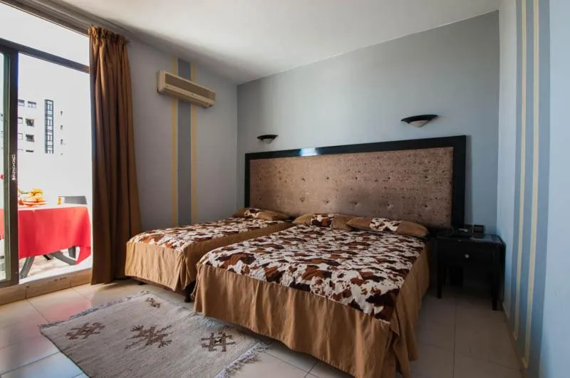 Bed in Hotel De La Paix