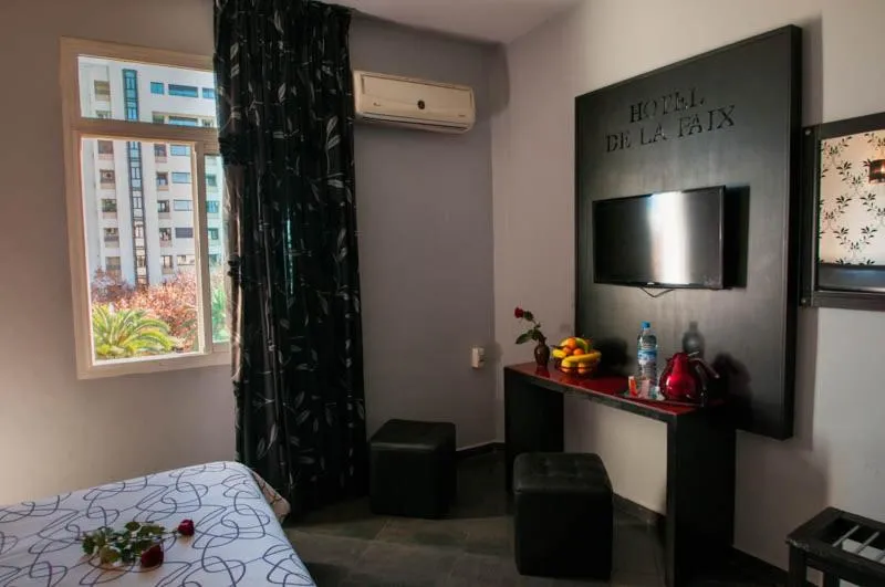 Bed in Hotel De La Paix