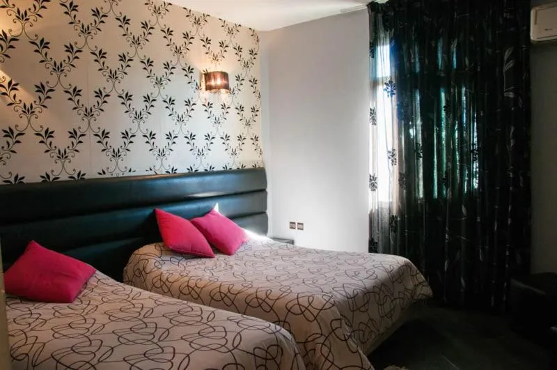 Bed in Hotel De La Paix