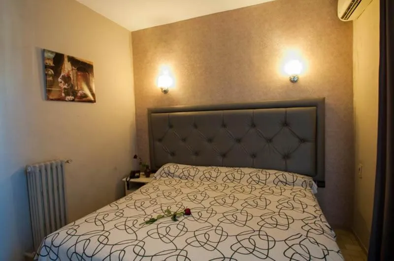 Bed in Hotel De La Paix