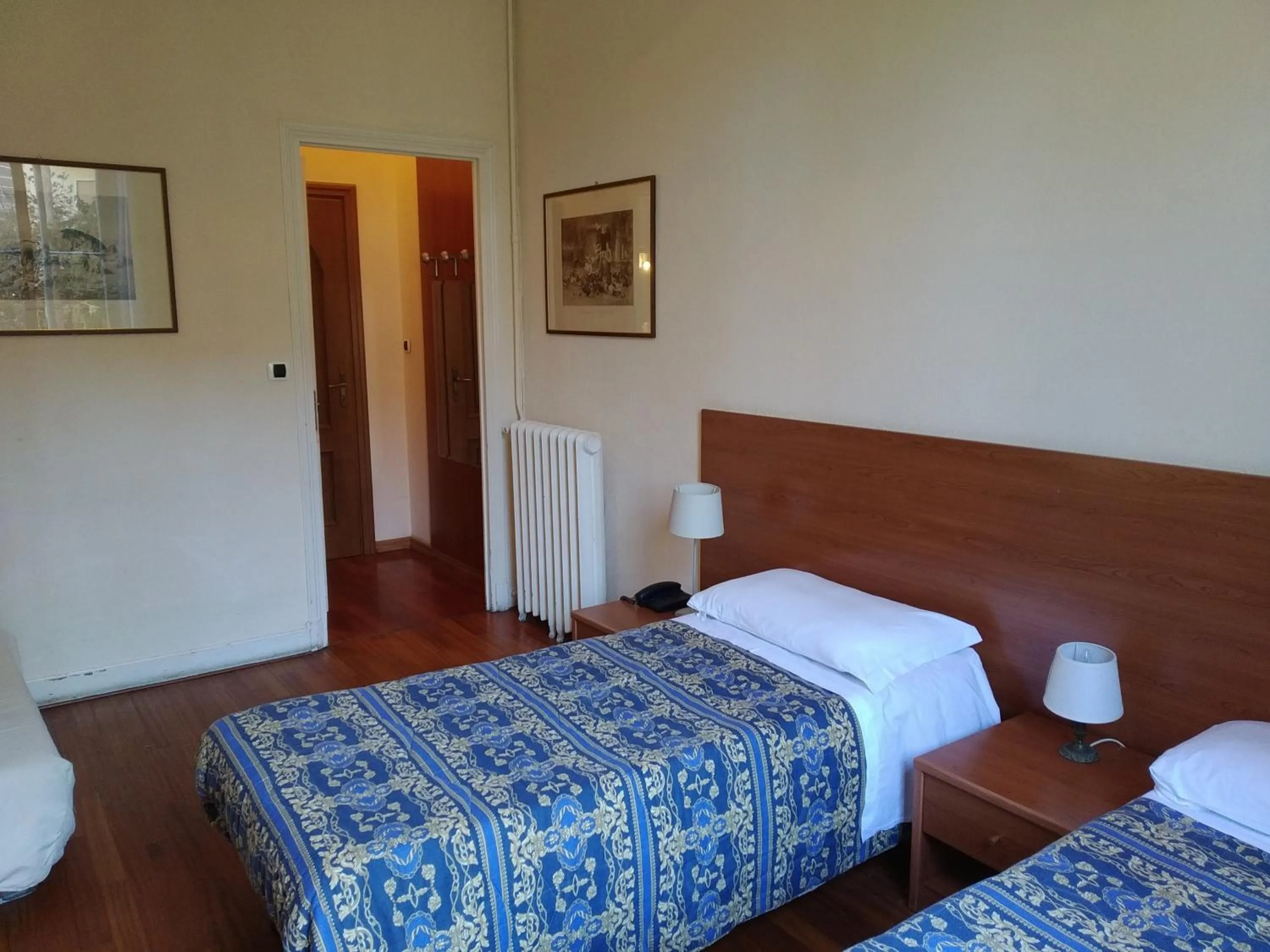 Bed in Hotel Lucciola
