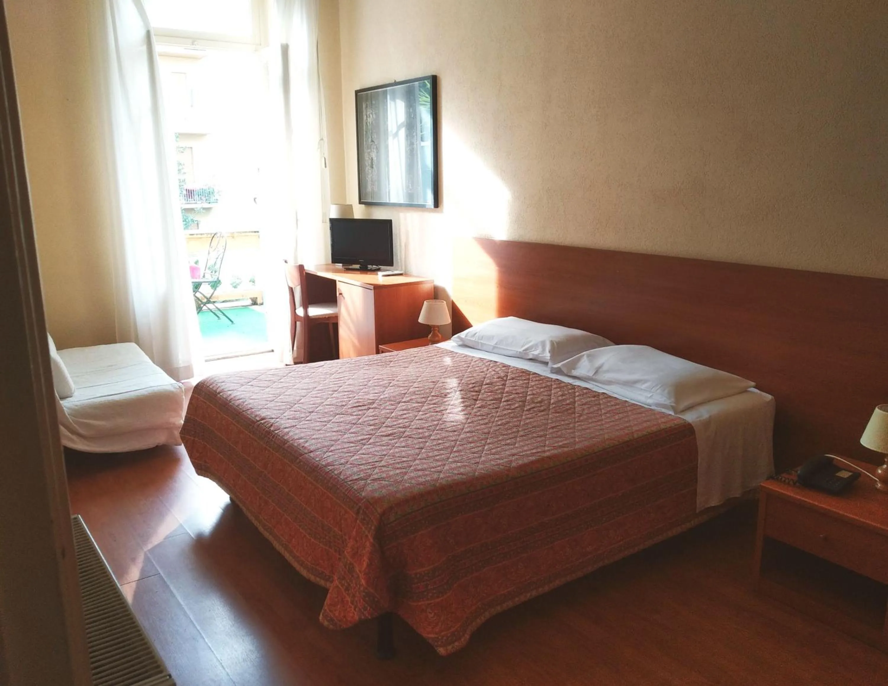 Bed in Hotel Lucciola