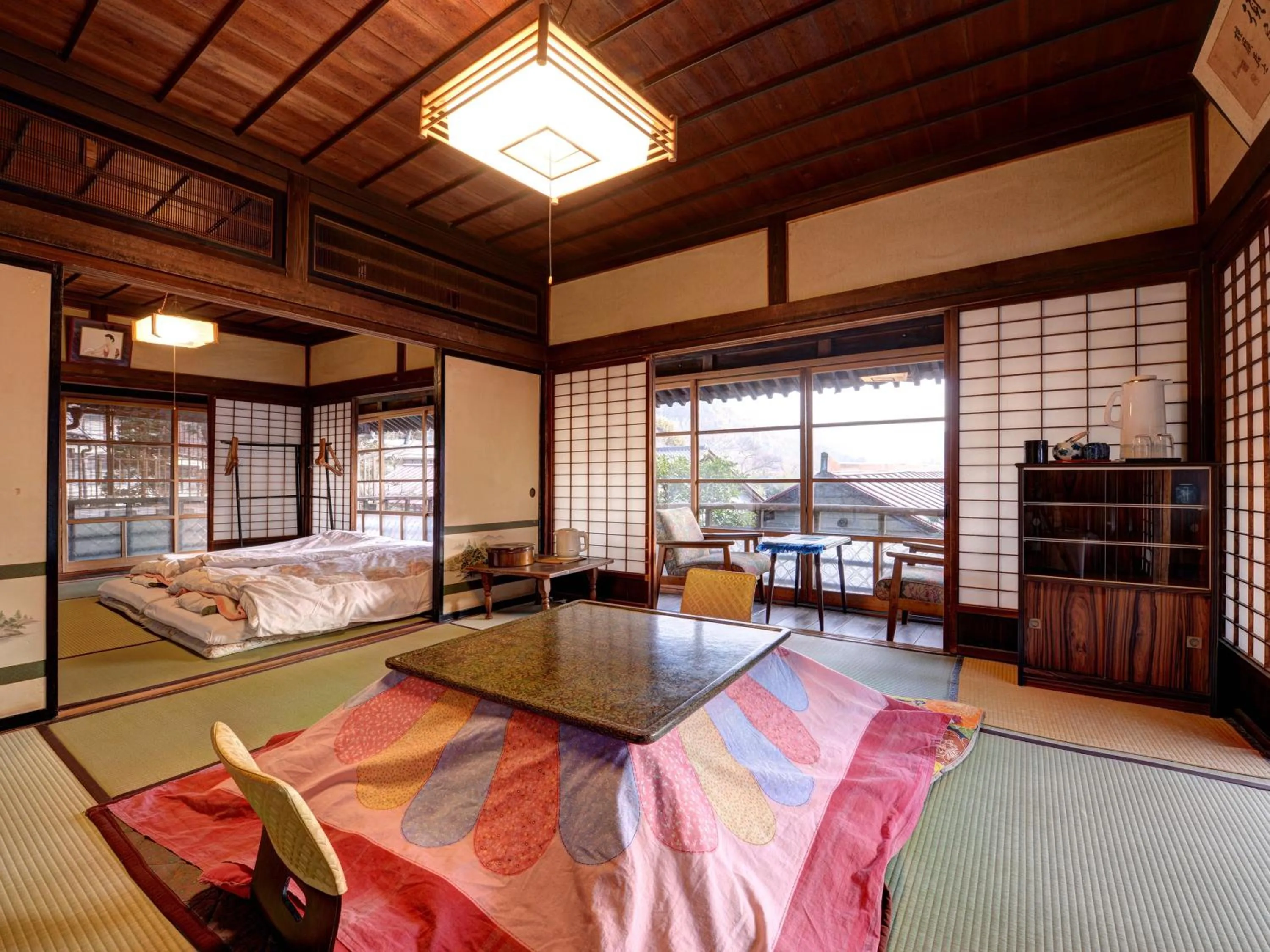 Living room, Bed in Masuya Ryokan