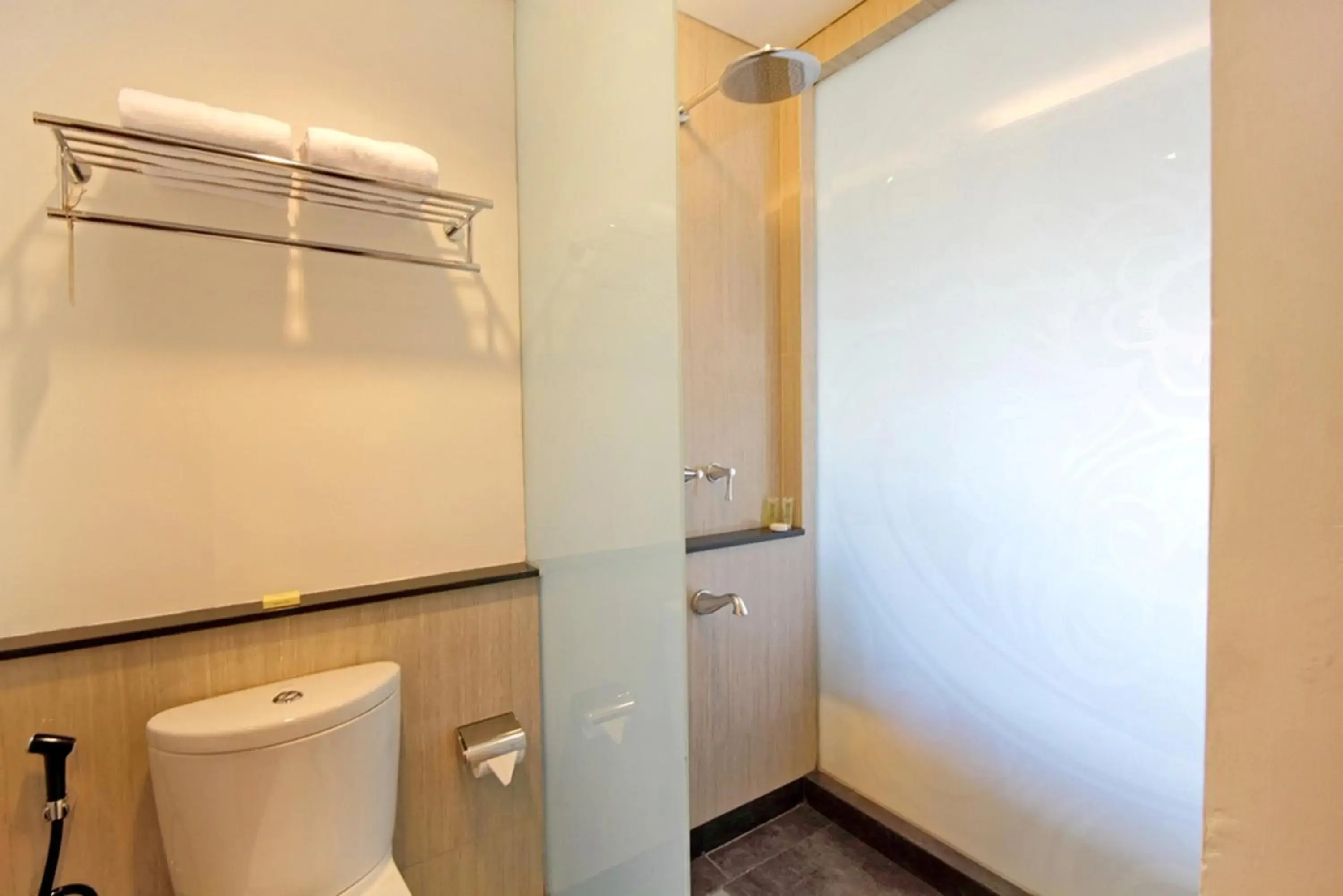 Bathroom in Hotel Santika Siligita Nusa Dua Bathroom in Hotel Santika Siligita Nusa Dua