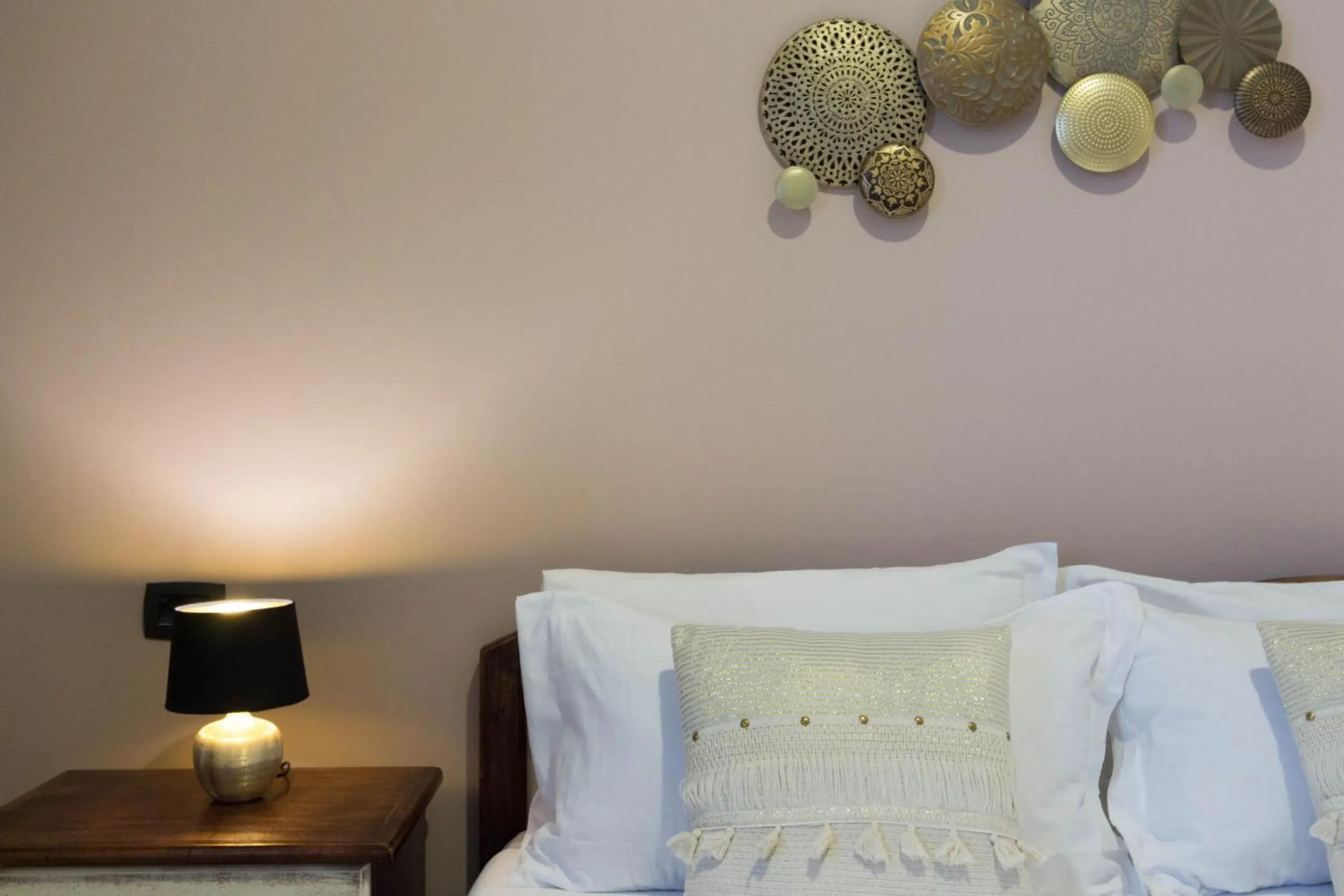 Bed in Arcobaleno Rooms