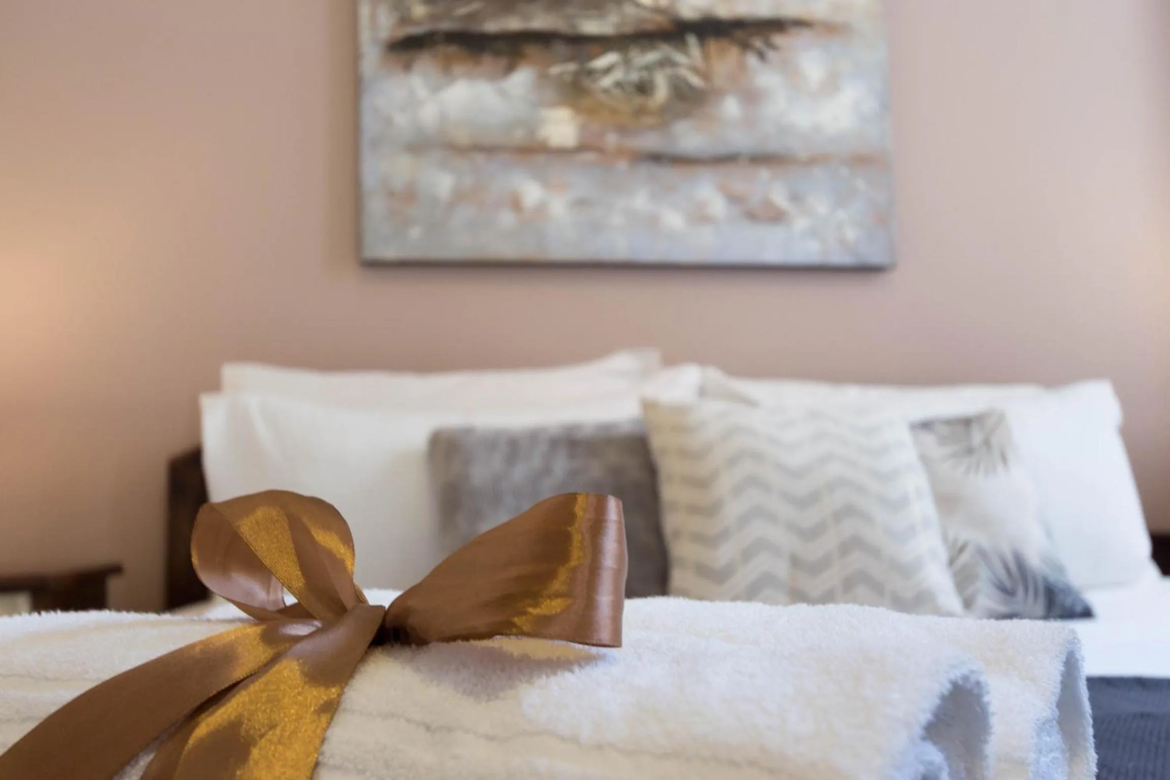 Bed in Arcobaleno Rooms