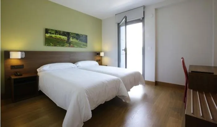 Photo of the whole room, Bed in Aginaga Hotela