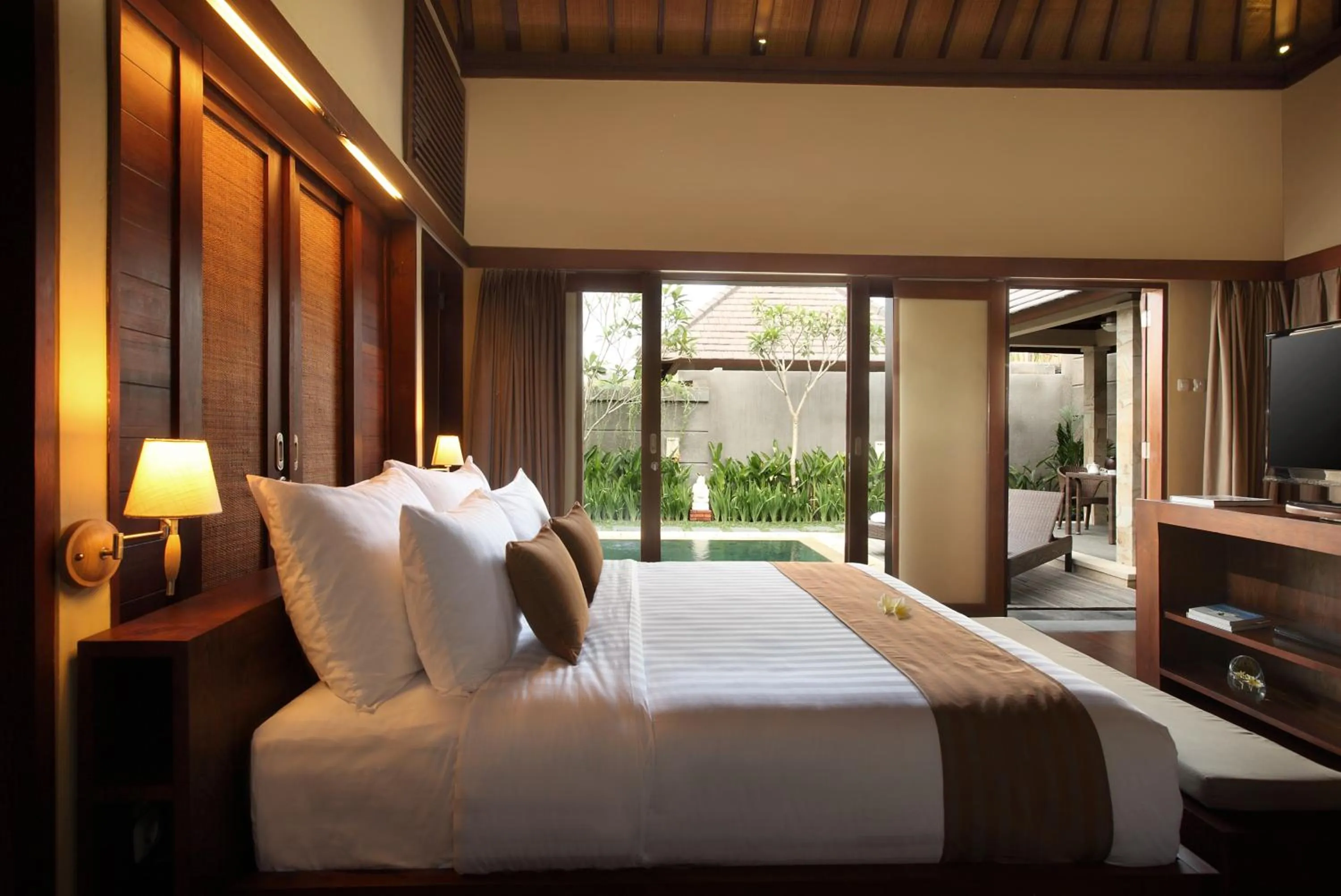 Bed in Nyuh Bali Villas
