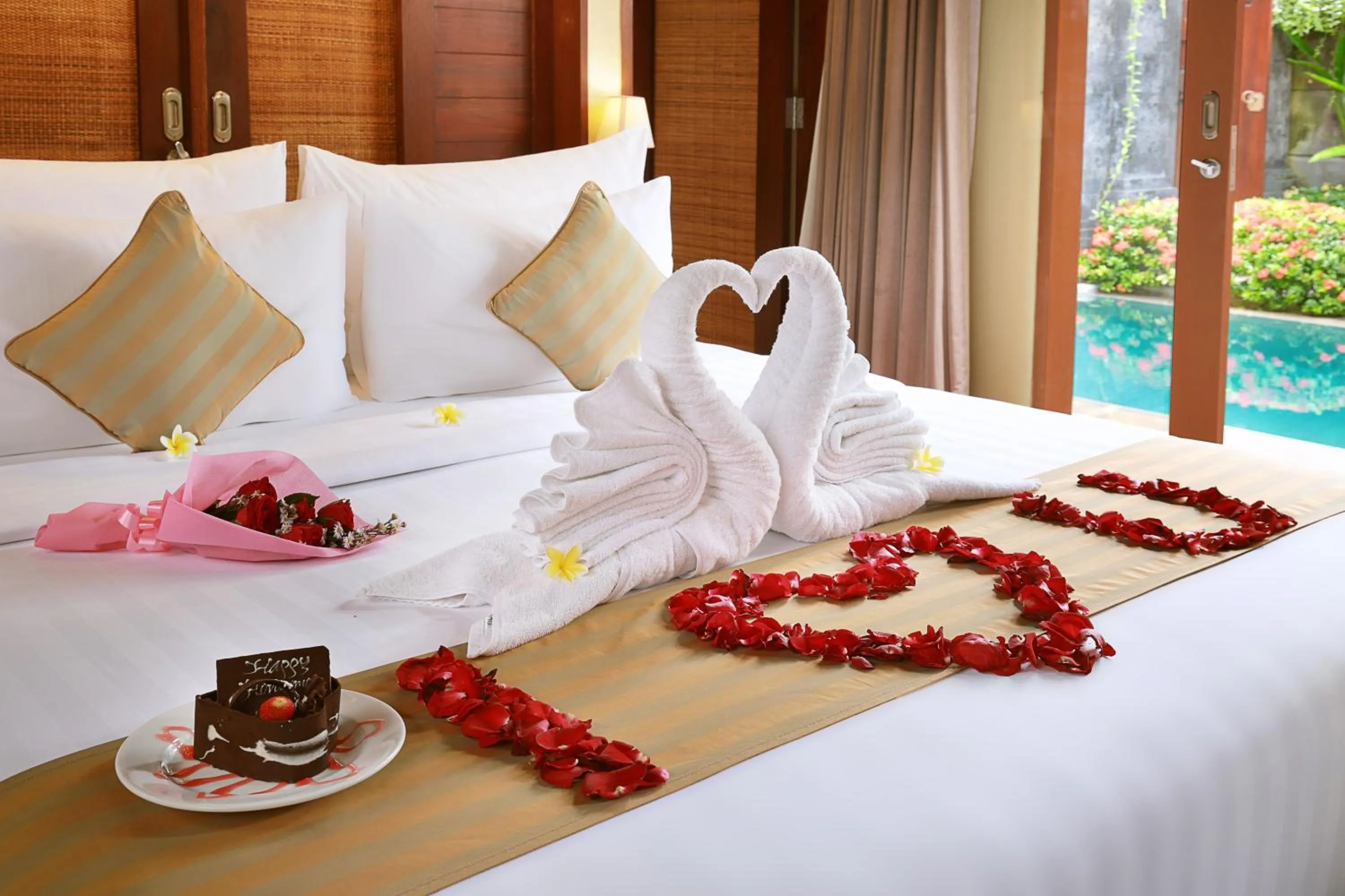 Bed in Nyuh Bali Villas