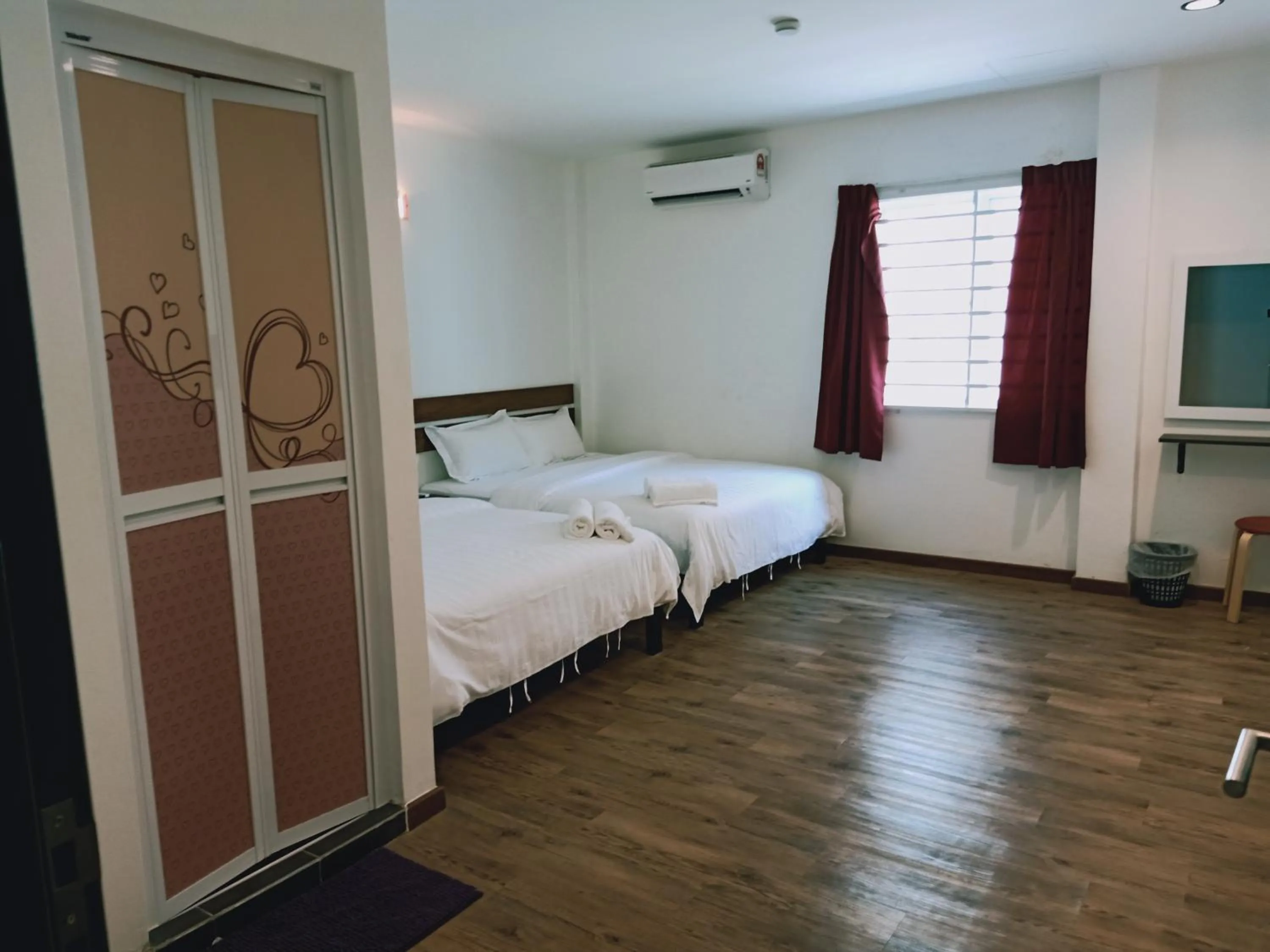 Bed in Cozy Riverside Hotel