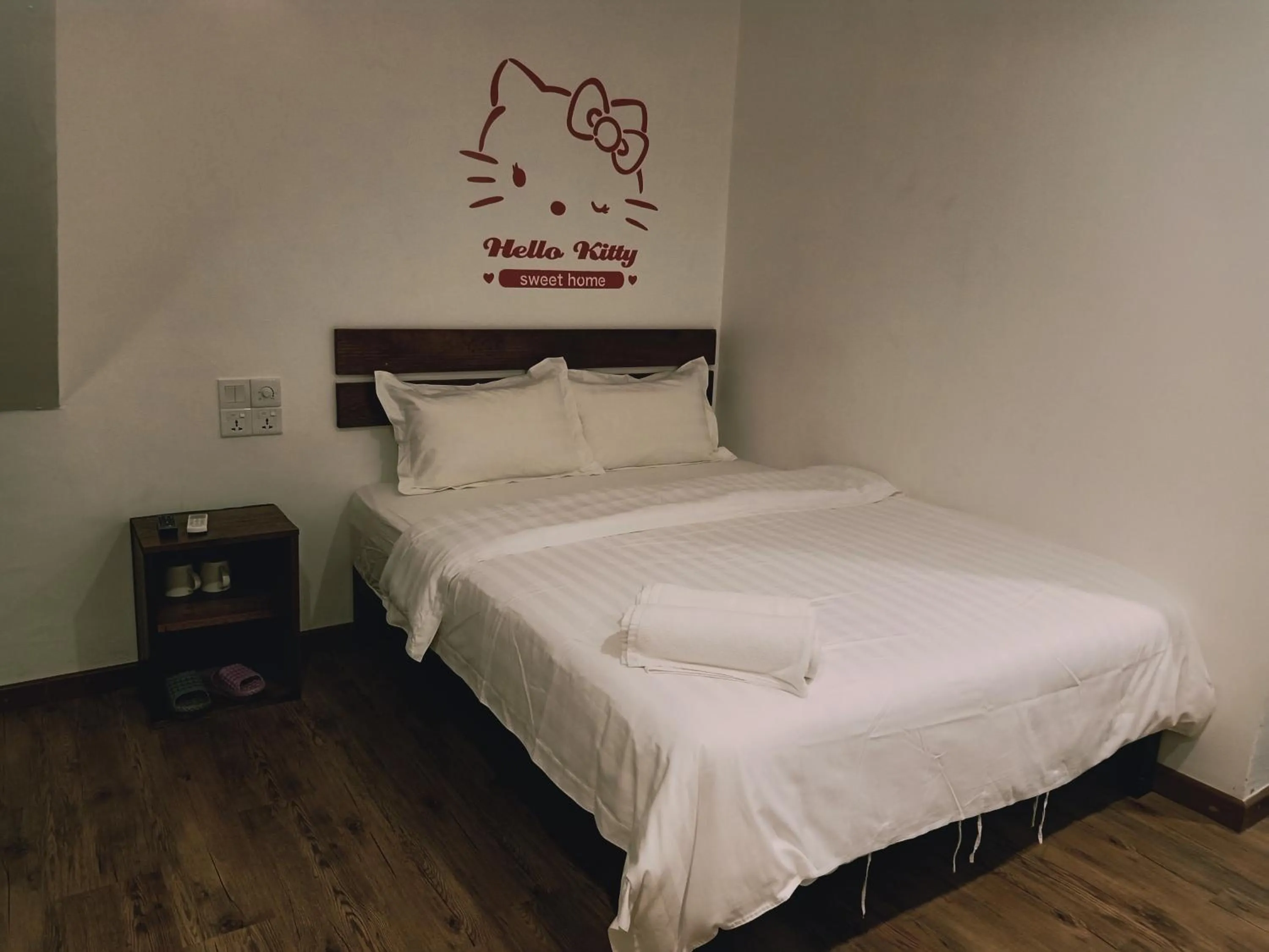 Bed in Cozy Riverside Hotel