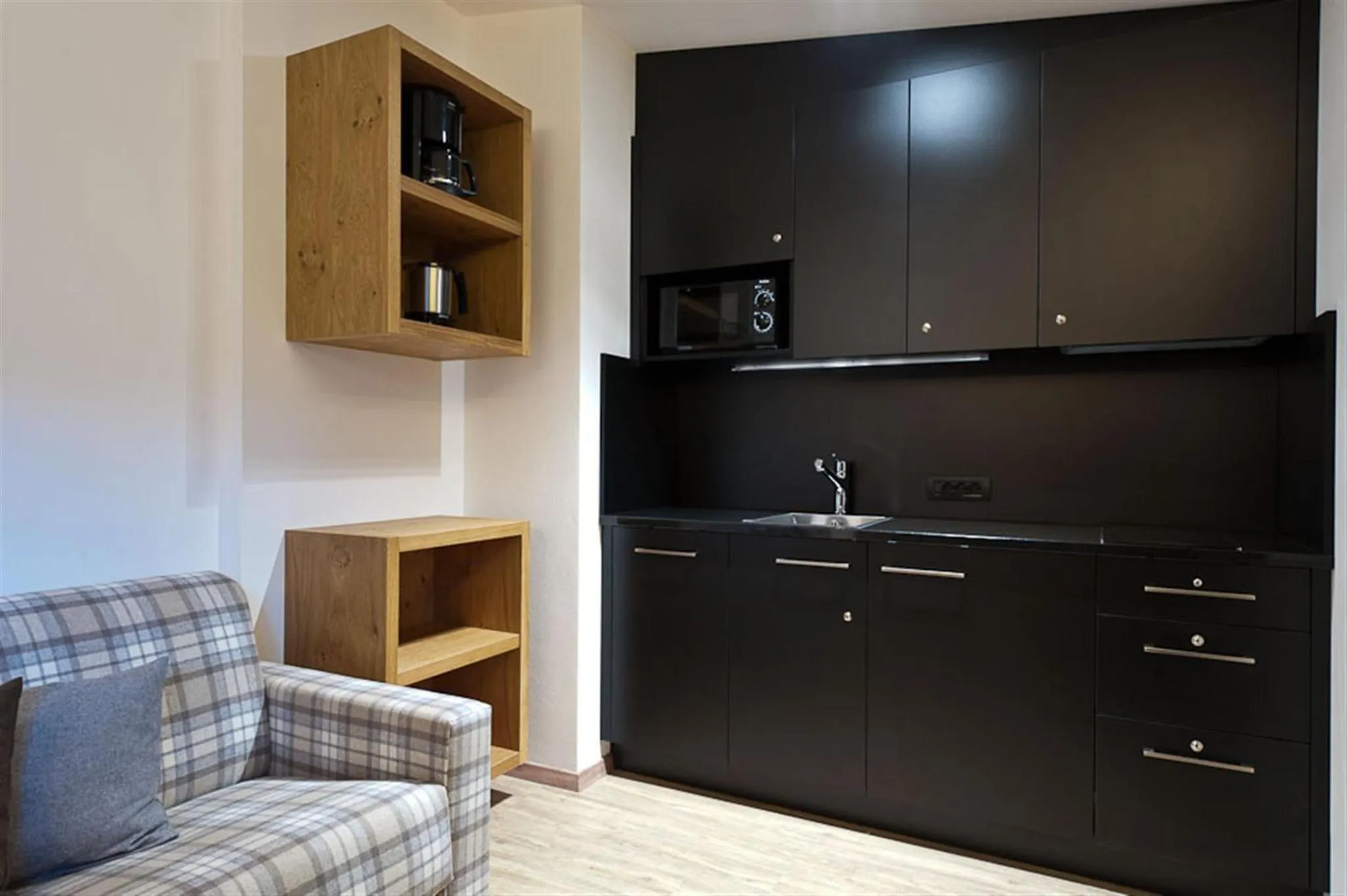 Kitchen or kitchenette in Burgus - Design Suites & Apartments