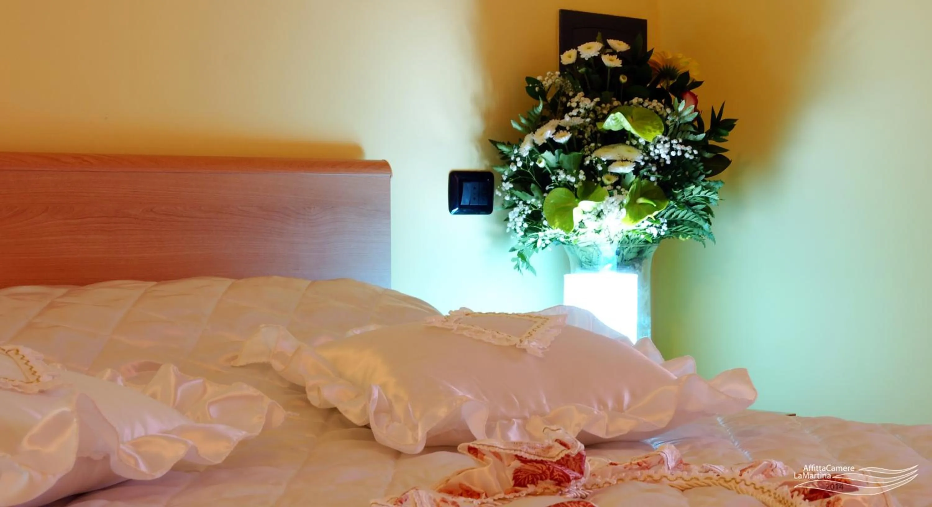 Decorative detail, Bed in Affittacamere La Martina