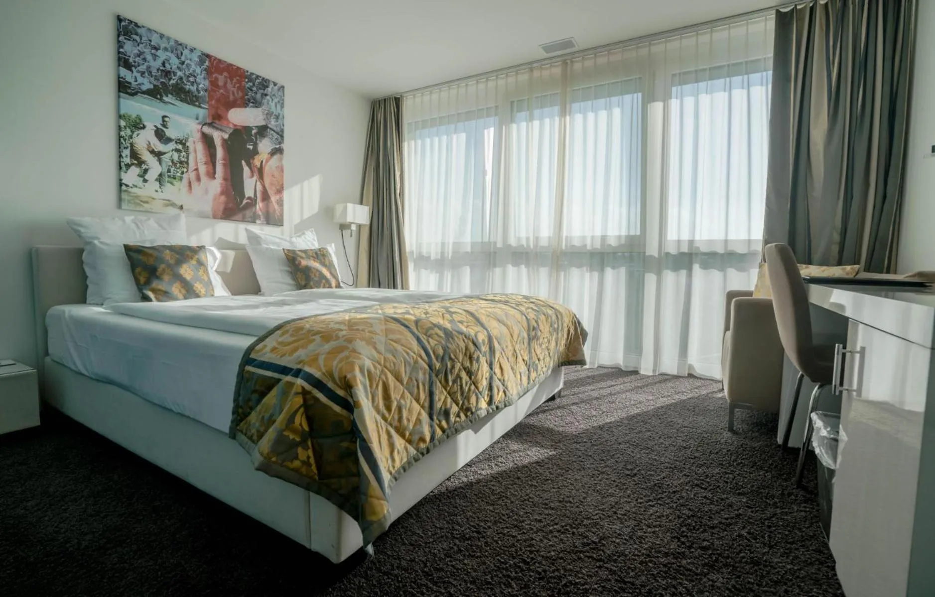 Bed in Hotel Swiss Star