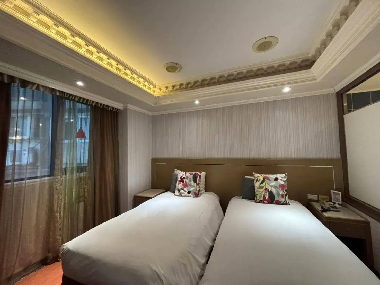 Bed in Tai Hope Hotel Bed in Tai Hope Hotel