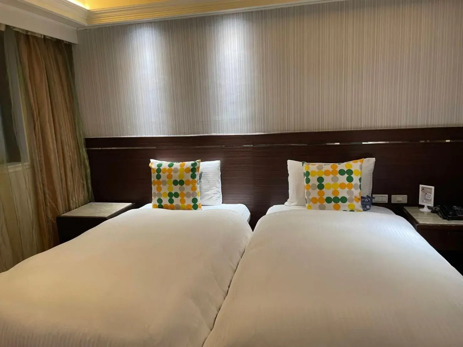 Bed in Tai Hope Hotel Bed in Tai Hope Hotel