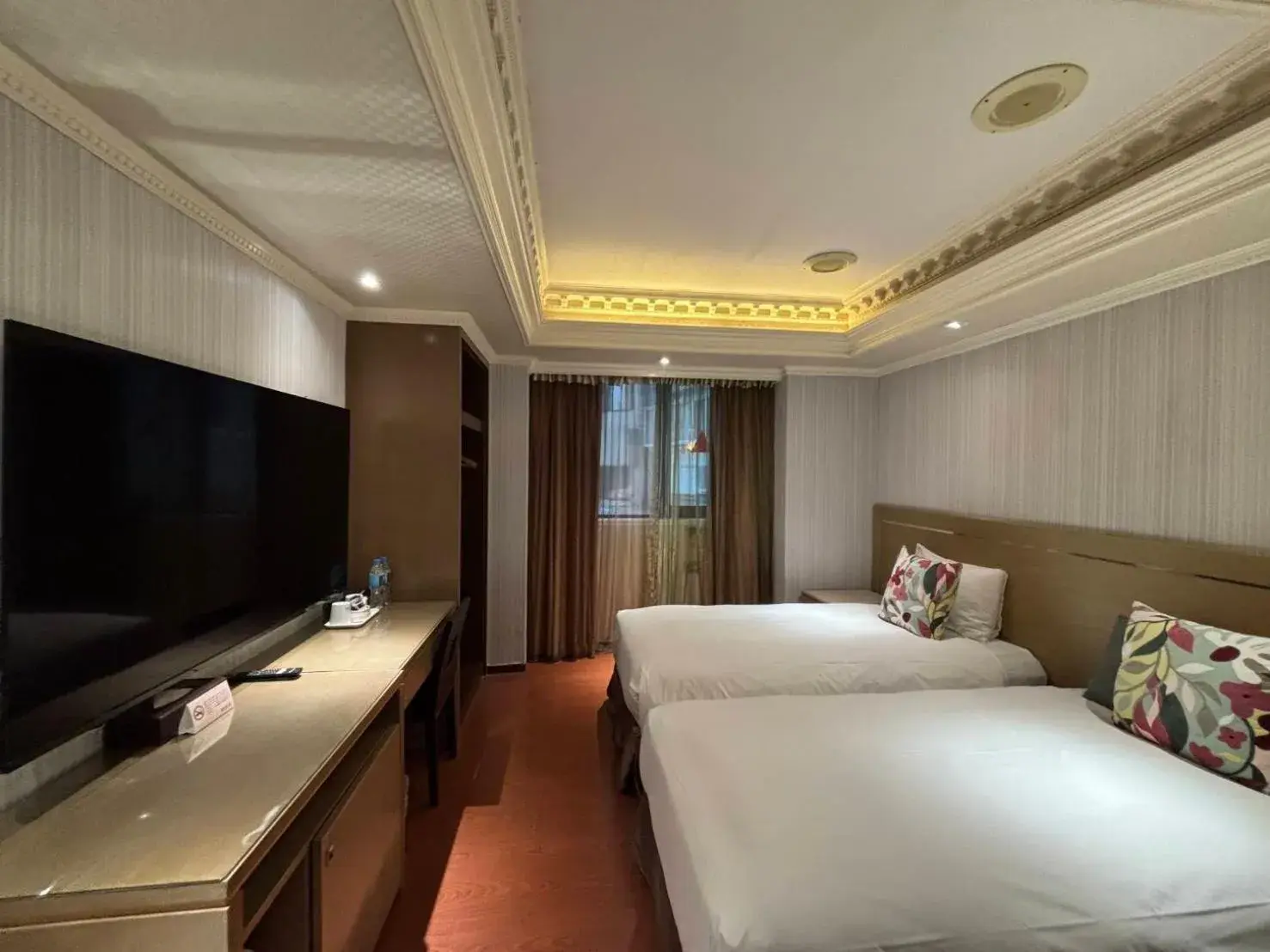 Bed in Tai Hope Hotel Bed in Tai Hope Hotel