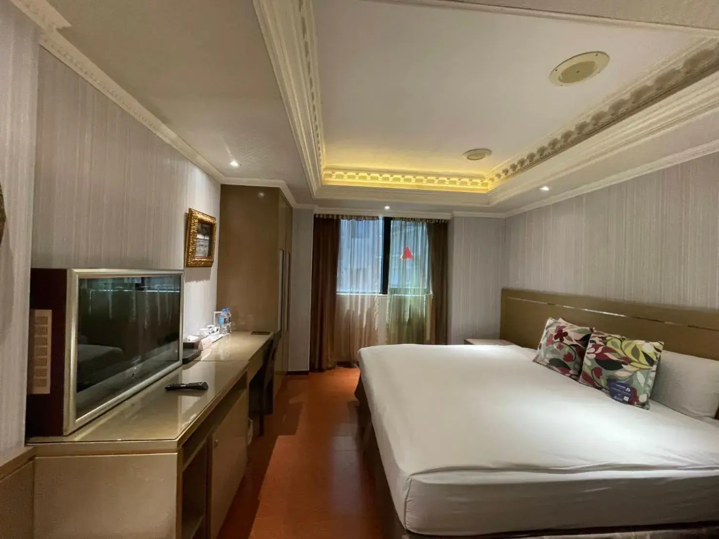 Bed in Tai Hope Hotel Bed in Tai Hope Hotel