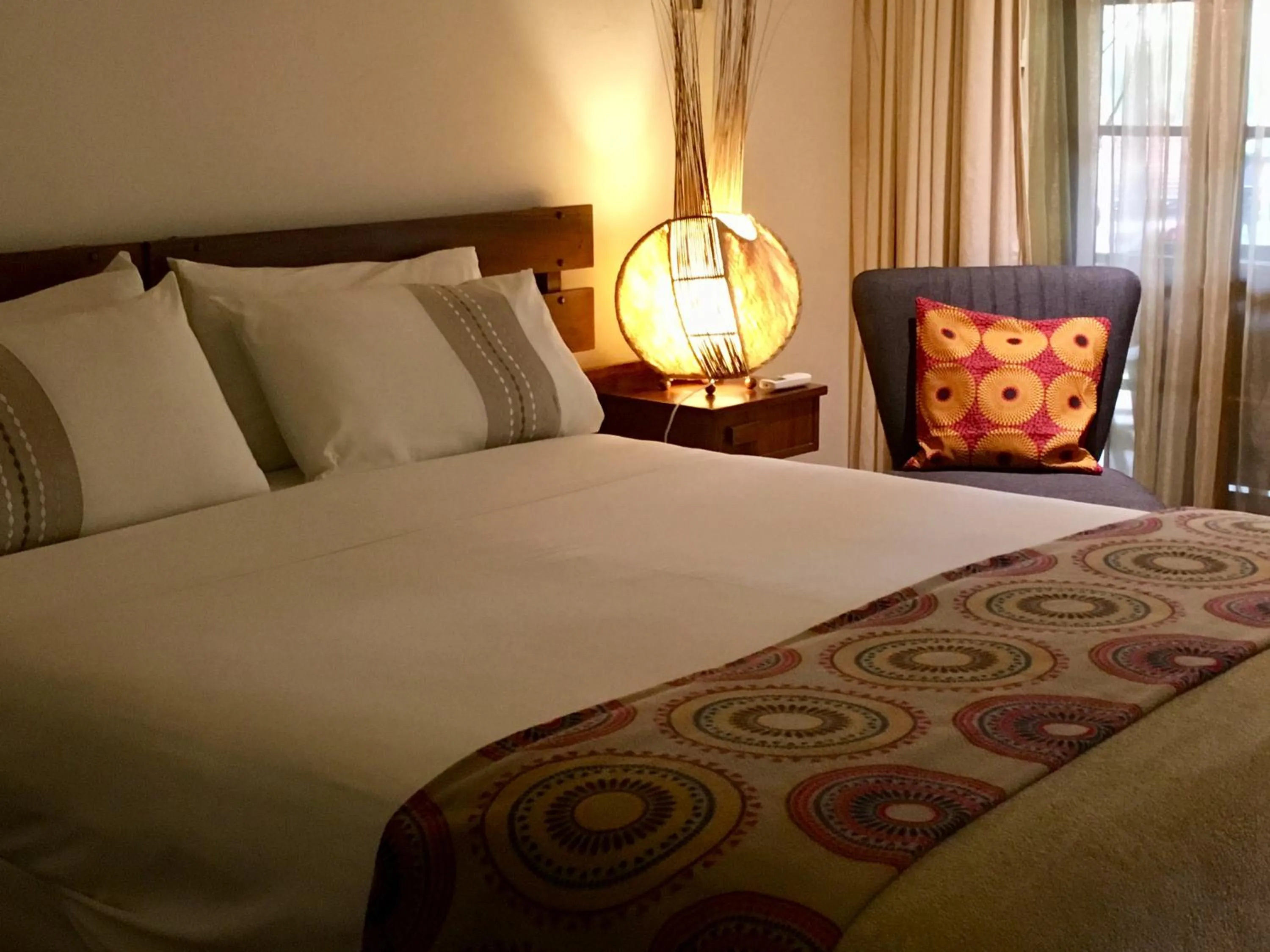 Bed in Afrikhaya Guest House