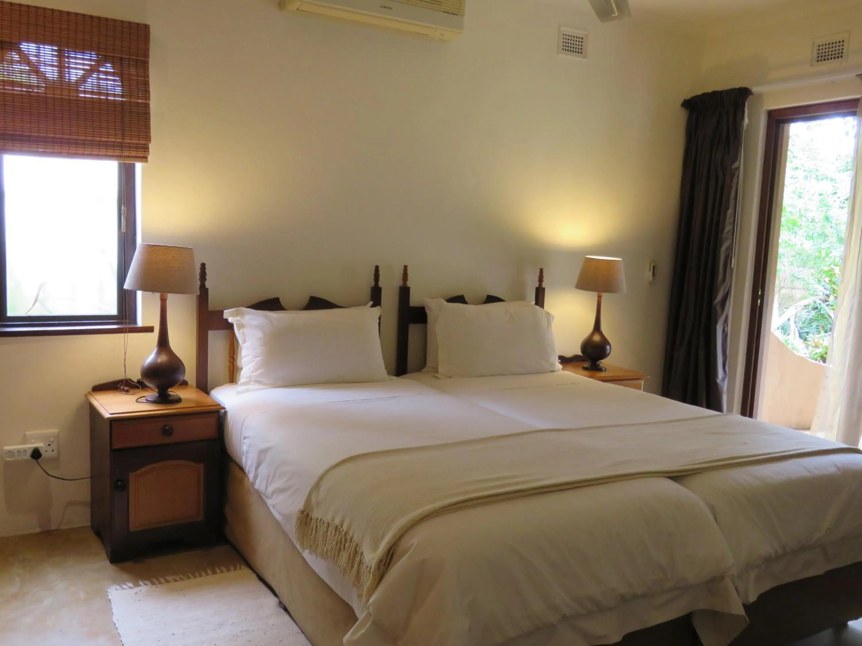 Bed in Afrikhaya Guest House