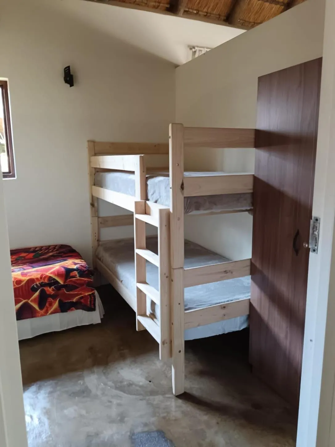 Bed in Afrikhaya Guest House