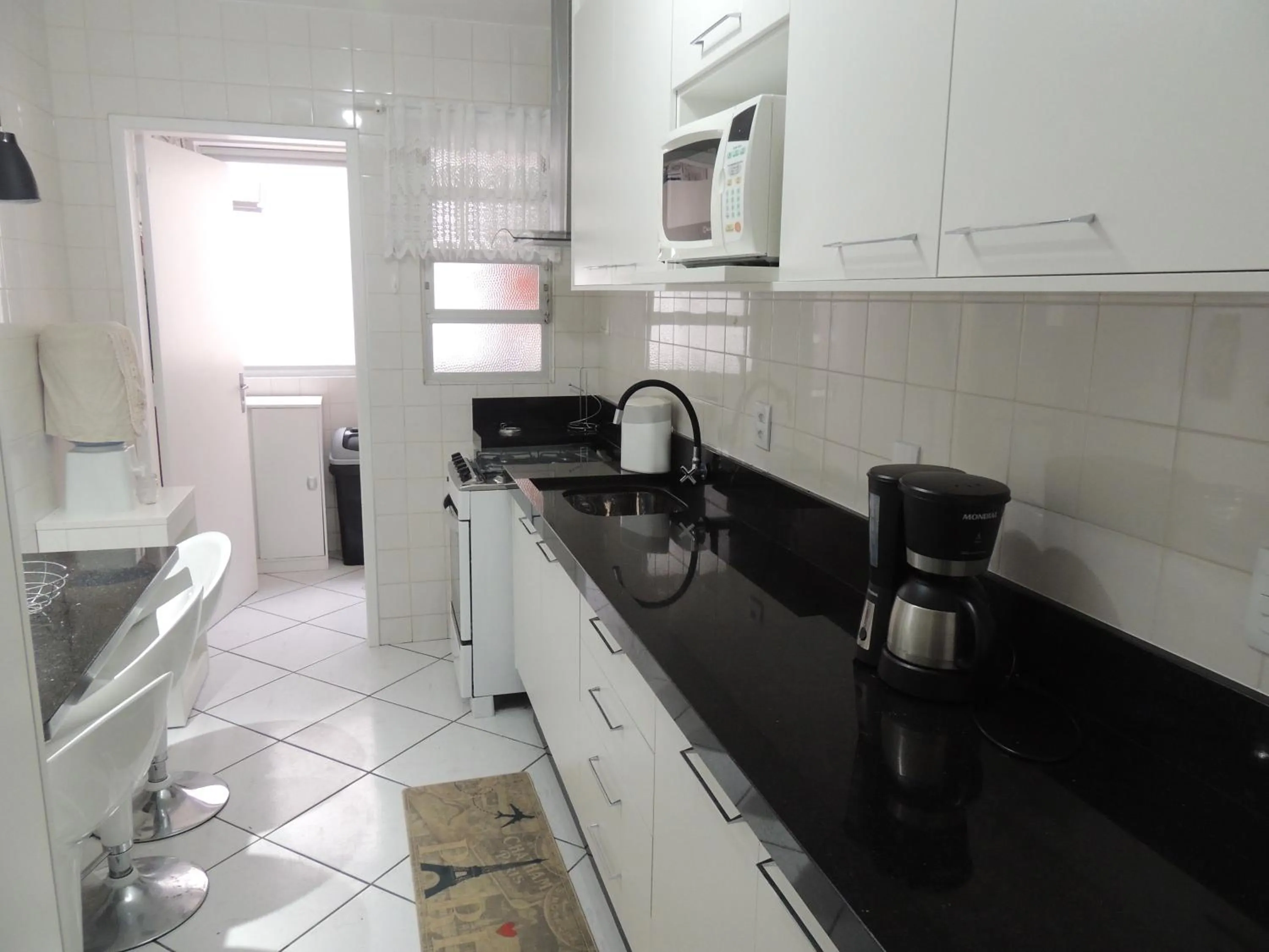 Kitchen or kitchenette in Apartamento Confortavel em Balneário Camboriu