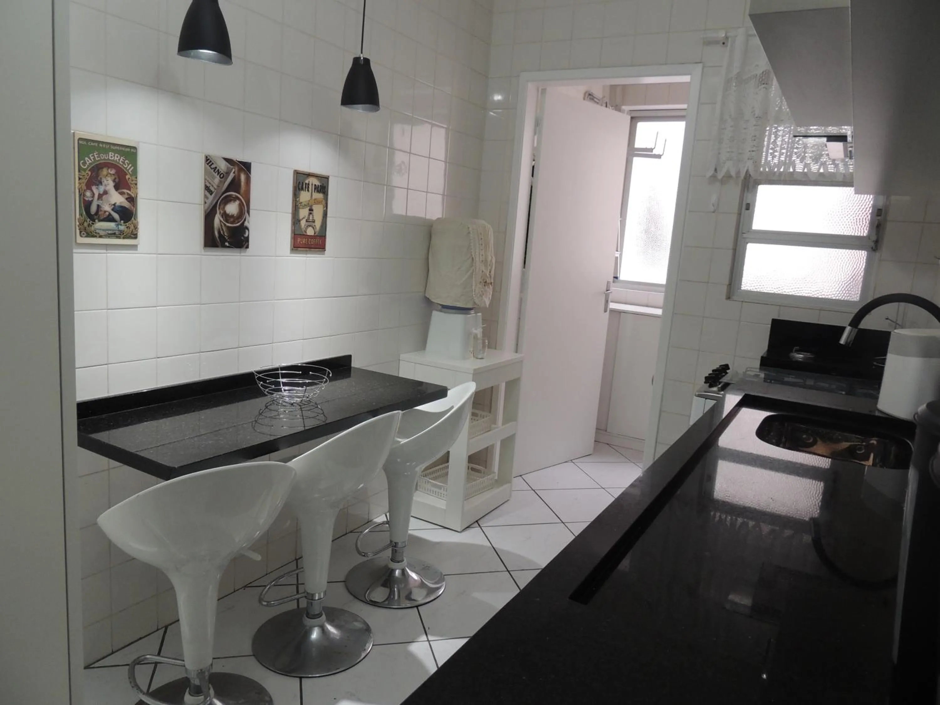 Kitchen or kitchenette in Apartamento Confortavel em Balneário Camboriu