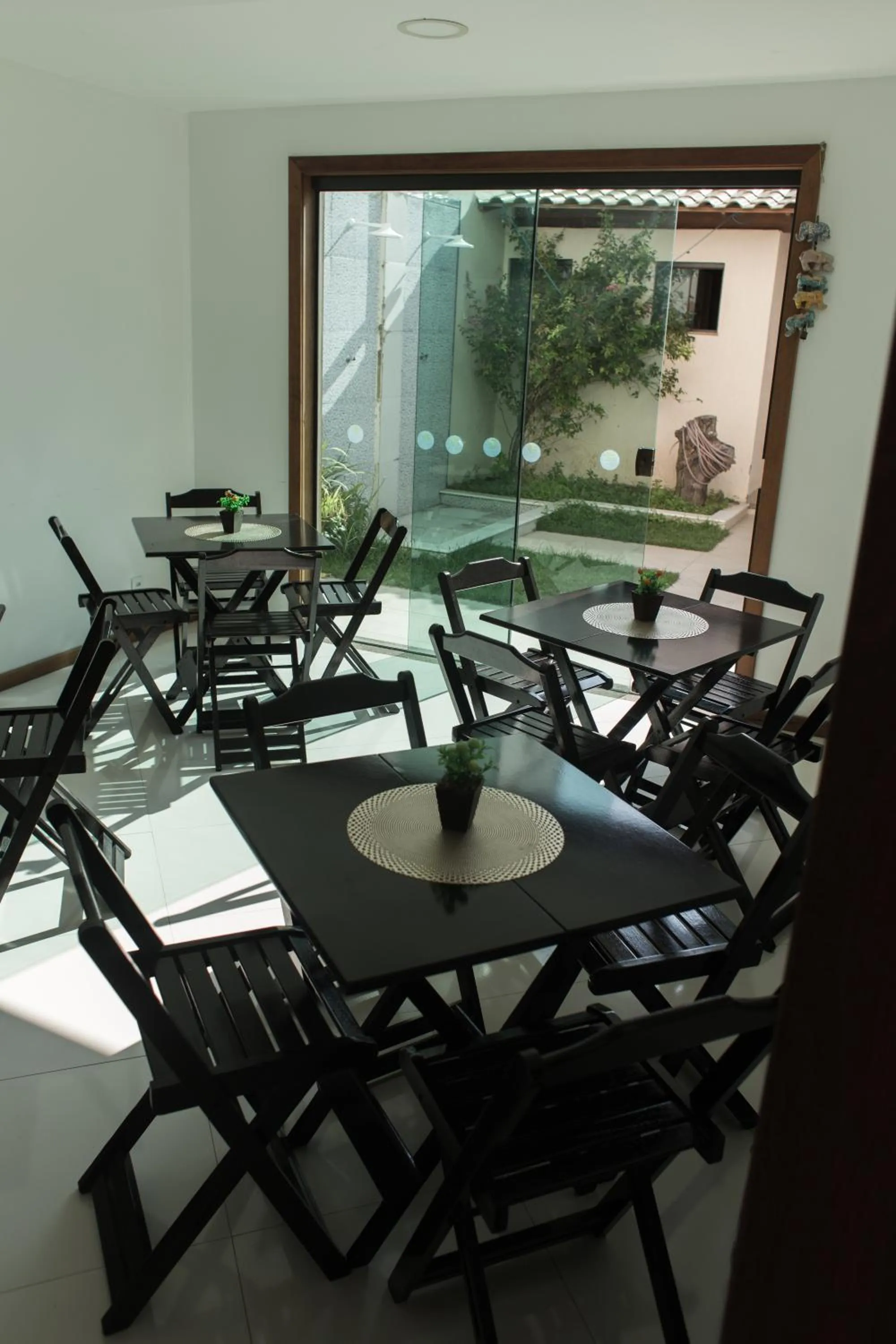 Dining area in Enseada Hostel