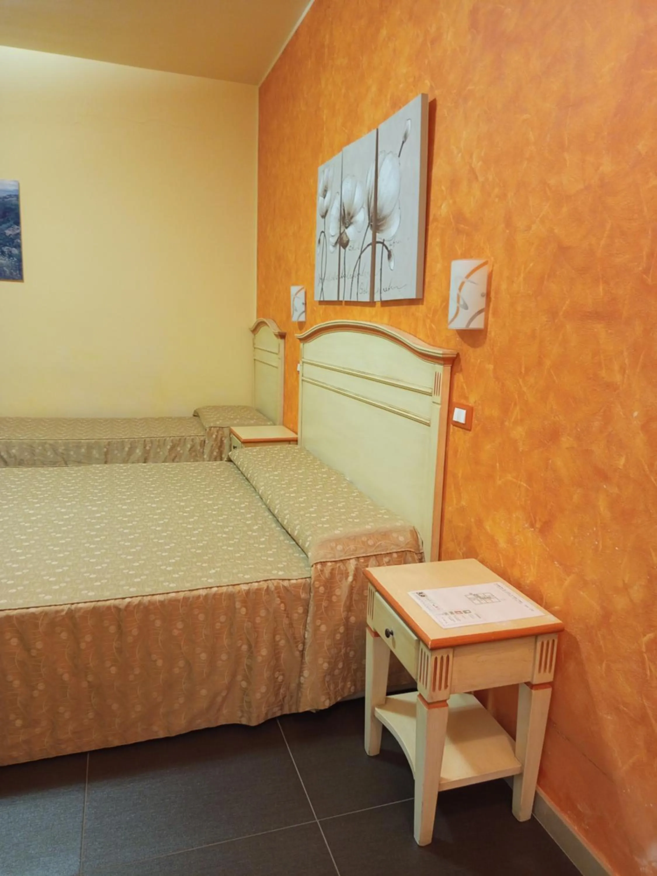 Bedroom in Amaryllis Hotel