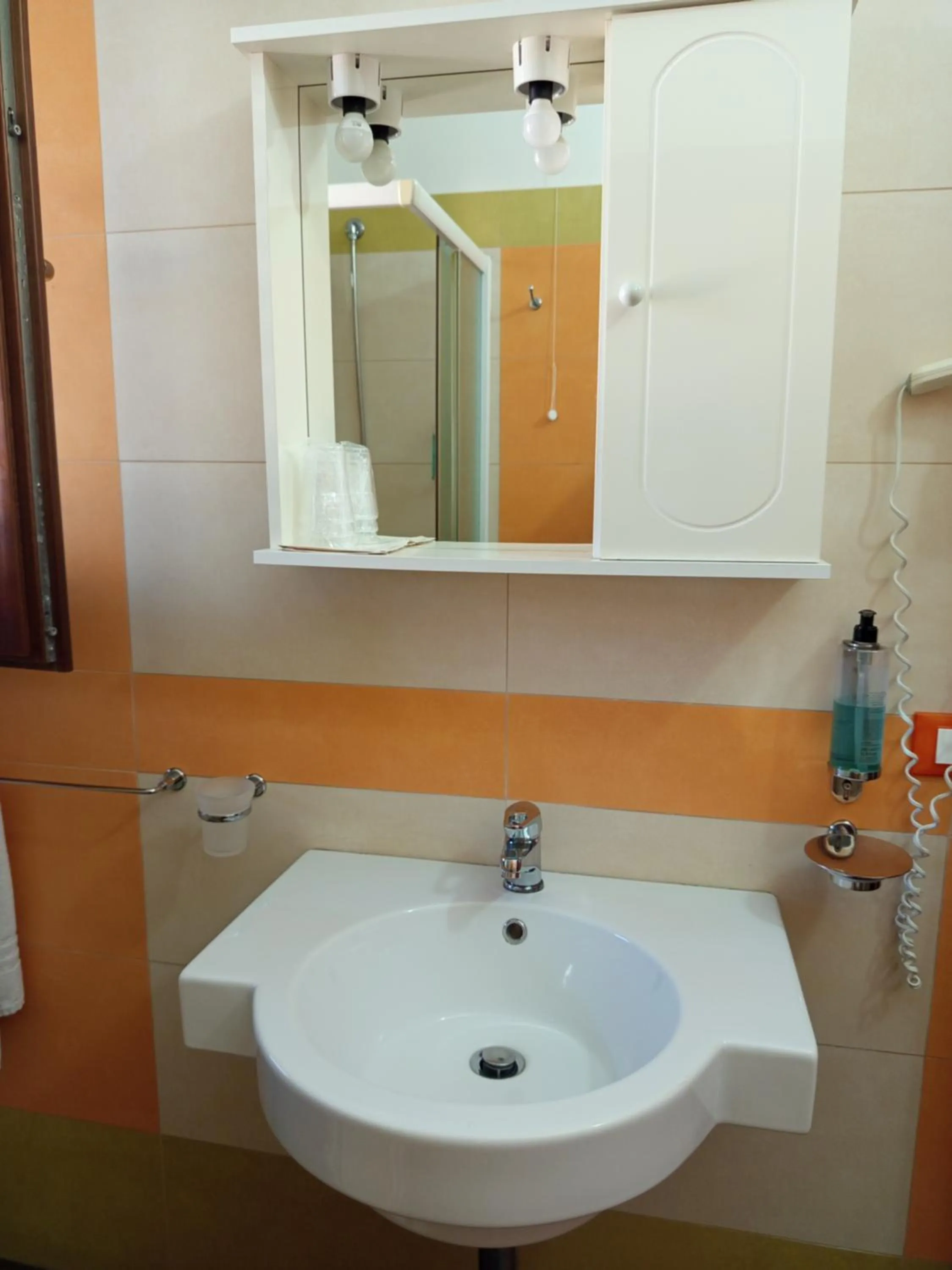 Bathroom in Amaryllis Hotel