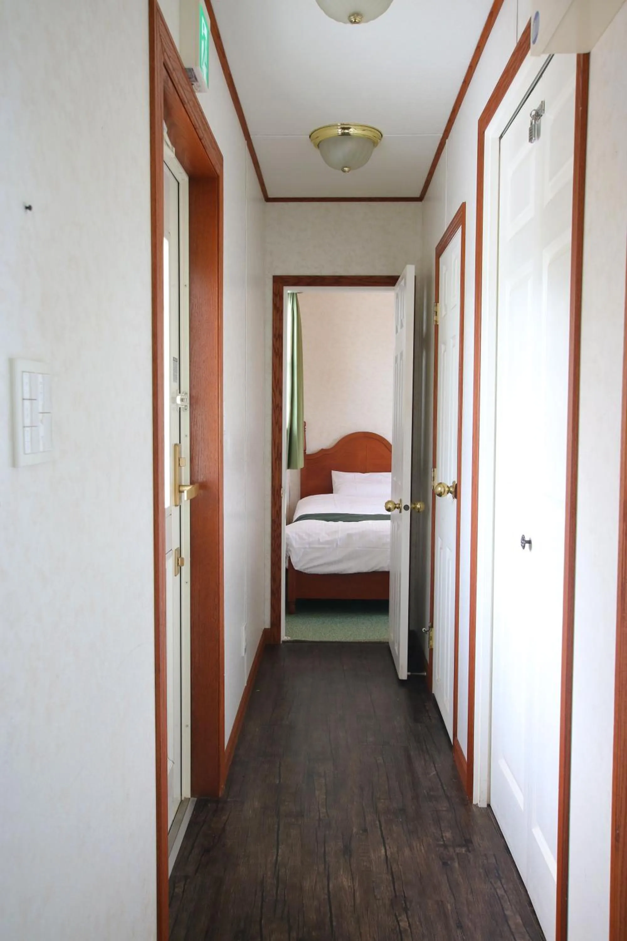 Bed in cottage NORTH OKINAWA -SEVEN HOTELS & Resorts-