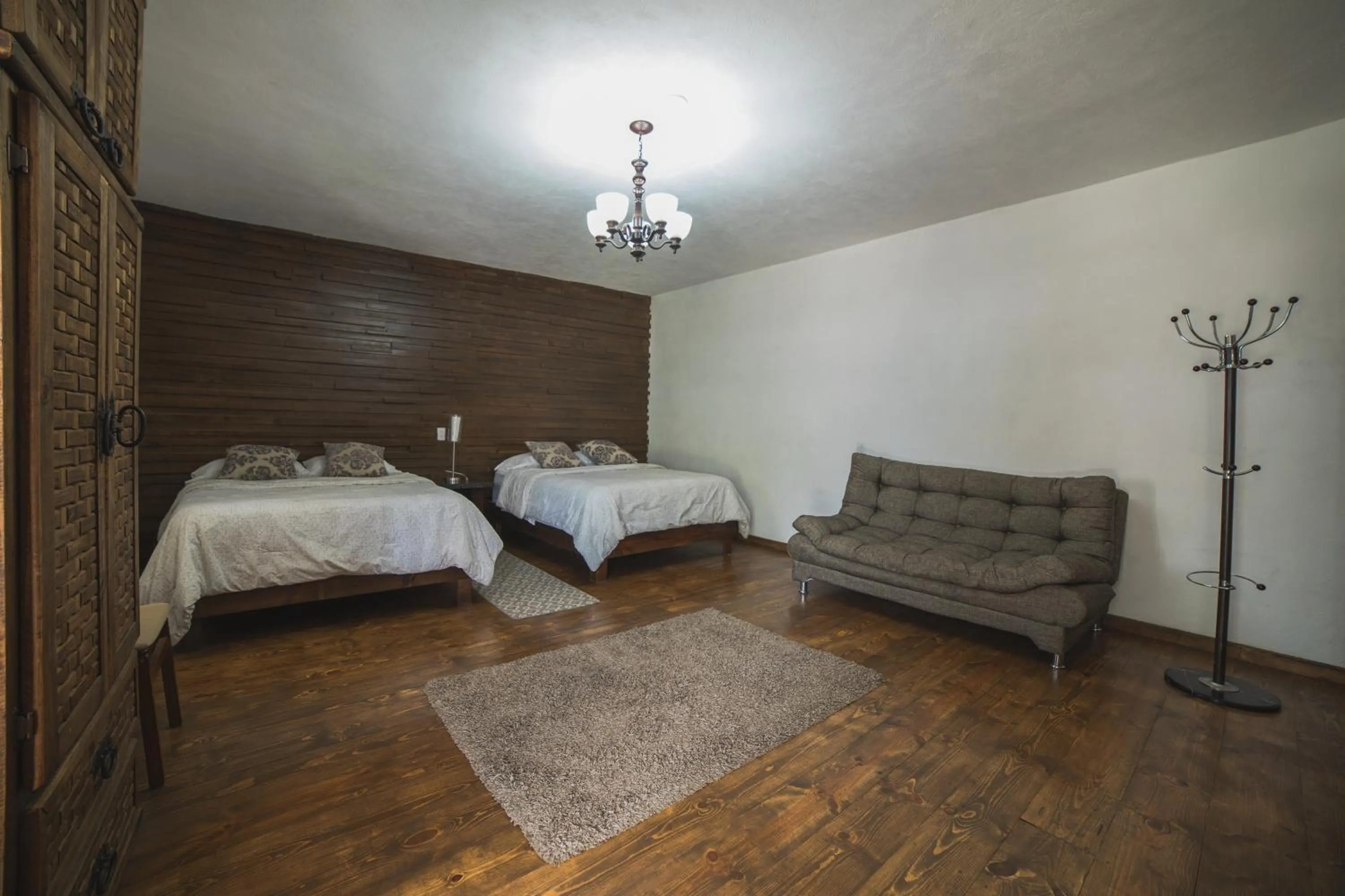 Living room, Bed in Hotel Posada las Nubes