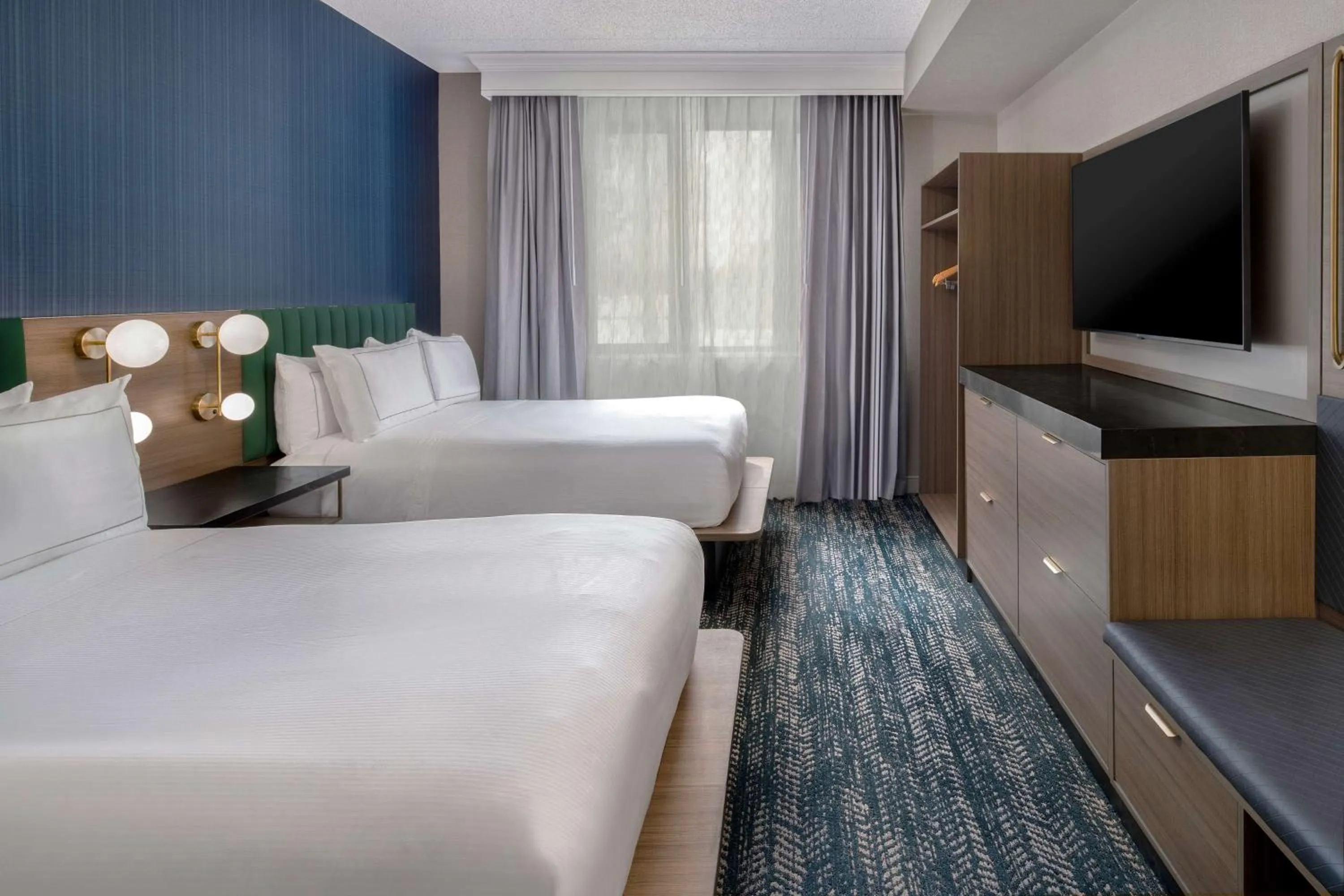 Bed in DoubleTree Suites by Hilton Mount Laurel