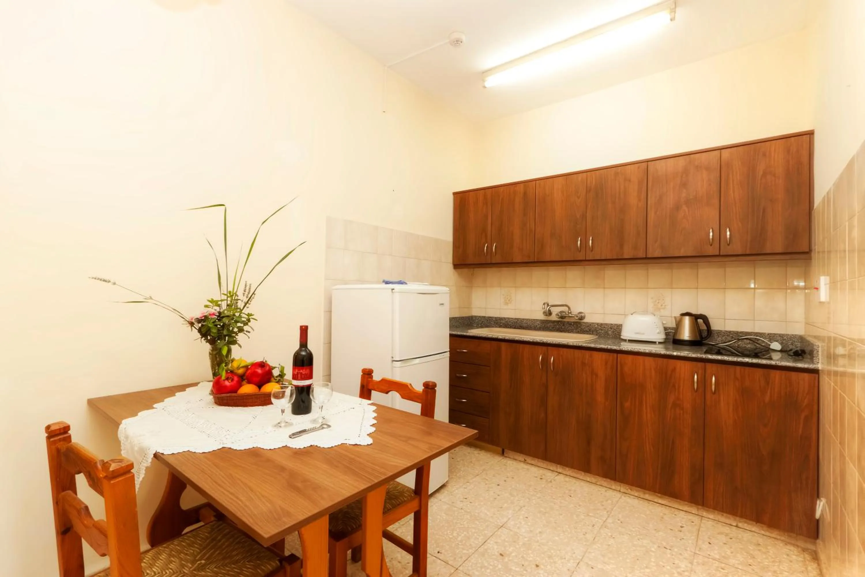 Kitchen or kitchenette in Follow The Sun Hotel Apartments