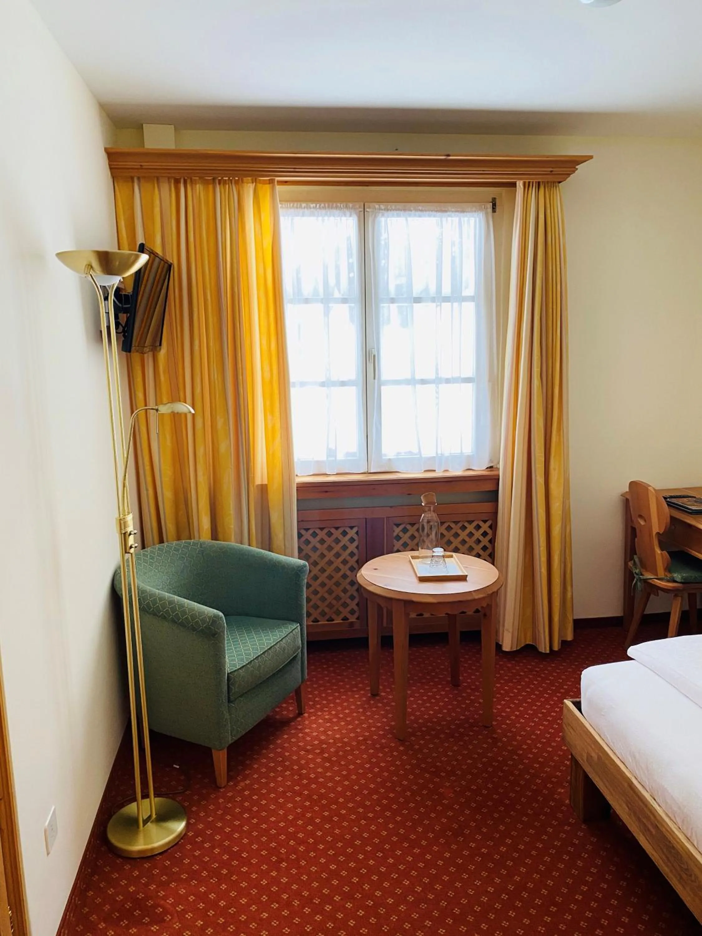 Seating area, Bed in Hotel Maria