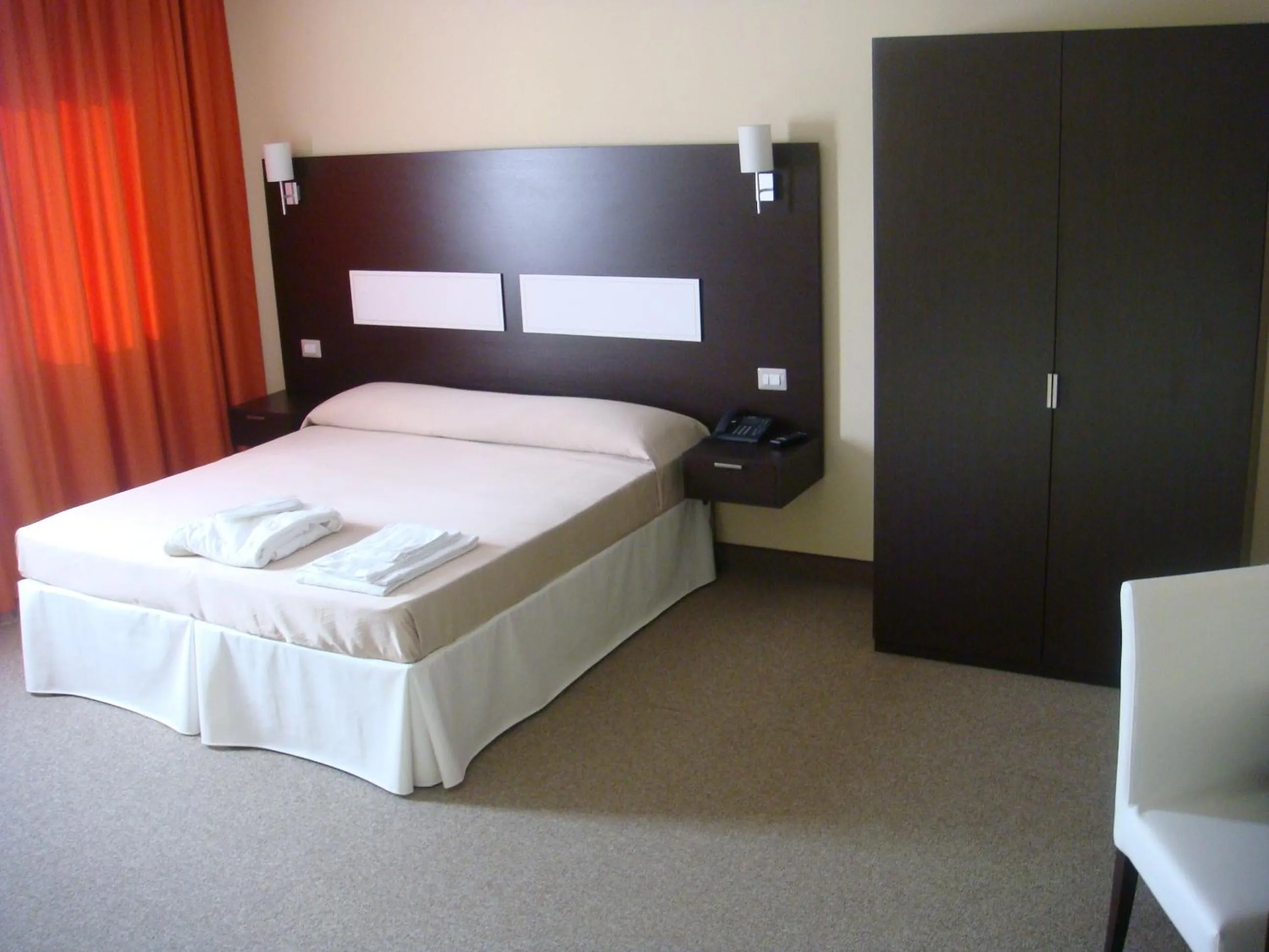 Bed in Santa Loja Hotel Residence