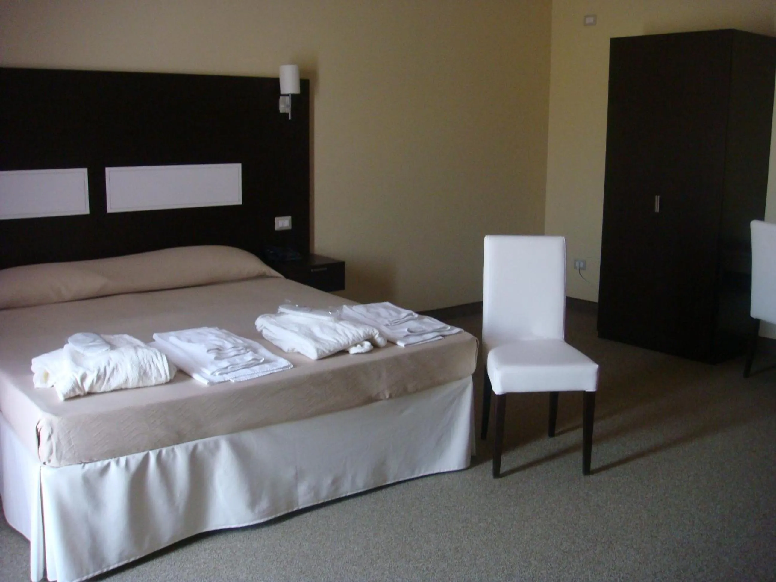 Bed in Santa Loja Hotel Residence