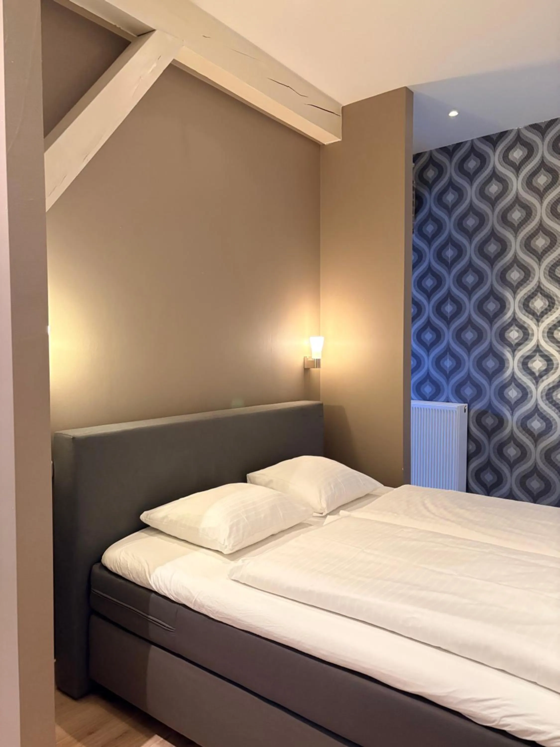 Bed in Stadslogement By Peek