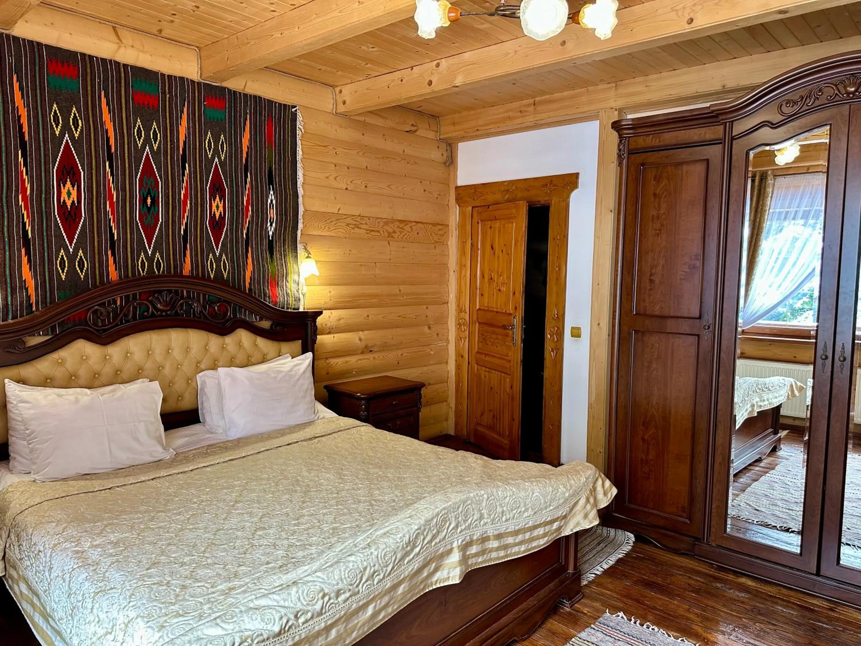 Bed in Hotel Dykyi Med