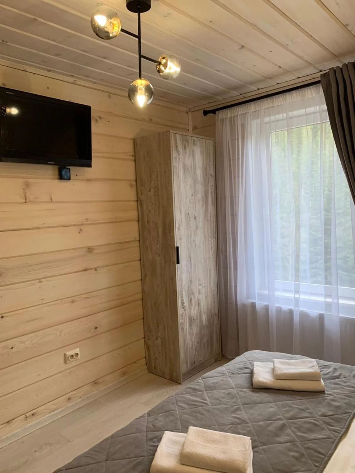 Bed in Hotel Dykyi Med